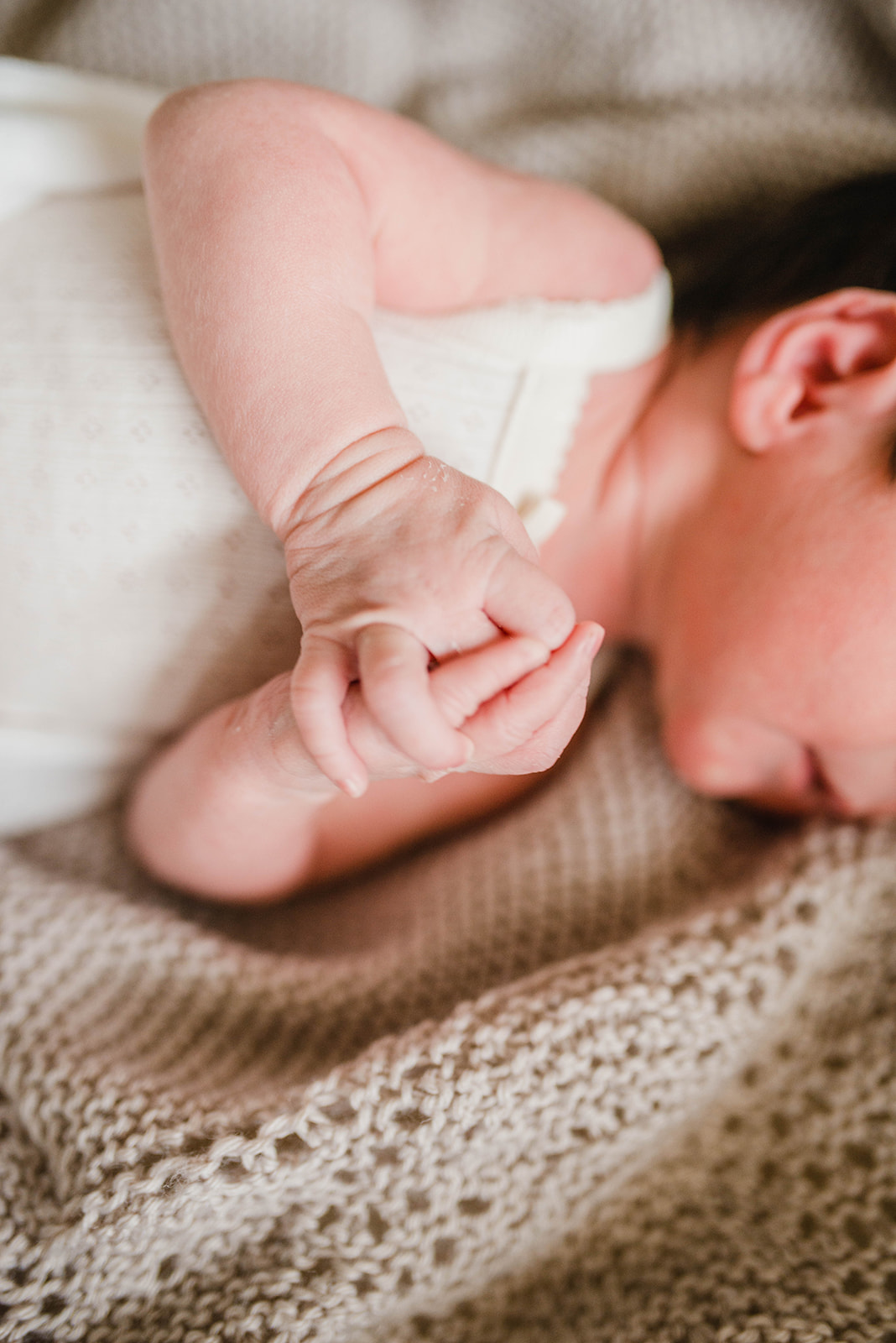 Photograph of newborn baby hands