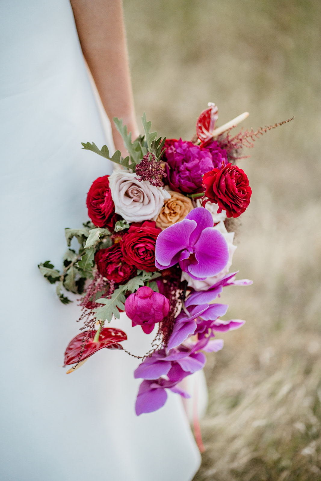 Bright colours wedding bouquet. Vibrant colours bridal bouquet. Mixed flowers wedding bouquet. Wedding bouquet ideas.
