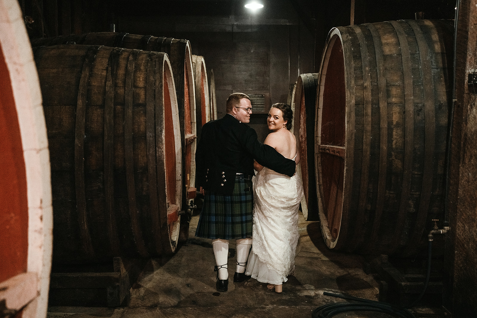Bride and groom photo in the Barrel Room at Brown Brothers, Milawa. Brown Brothers wedding photographer.