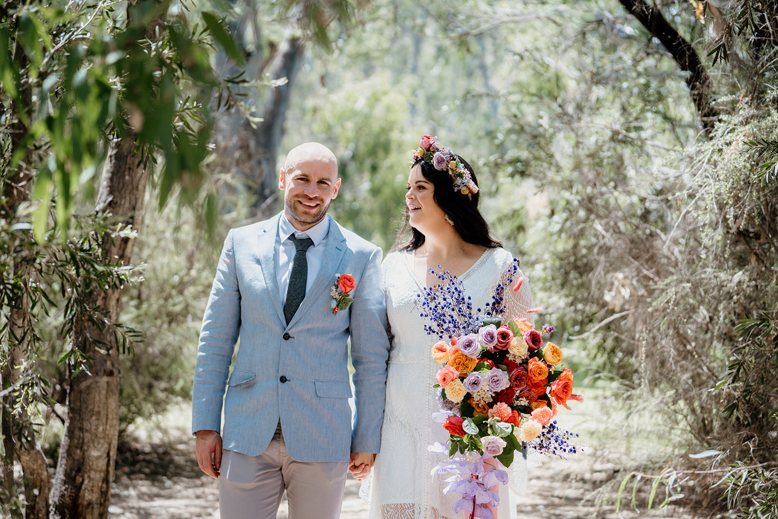 Wedding in Wonga Wetlands, Albury. Bride and groom natural photo. Vibrant colour wedding bouquet. Bright colour wedding.