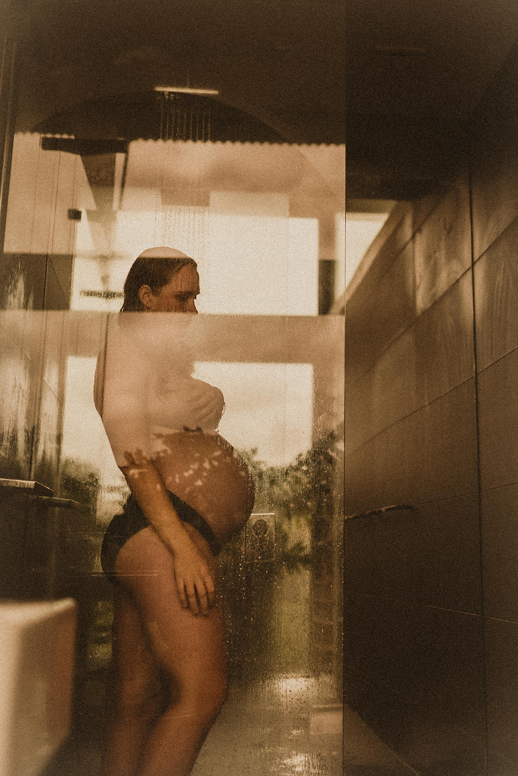 Pregnant mother in shower