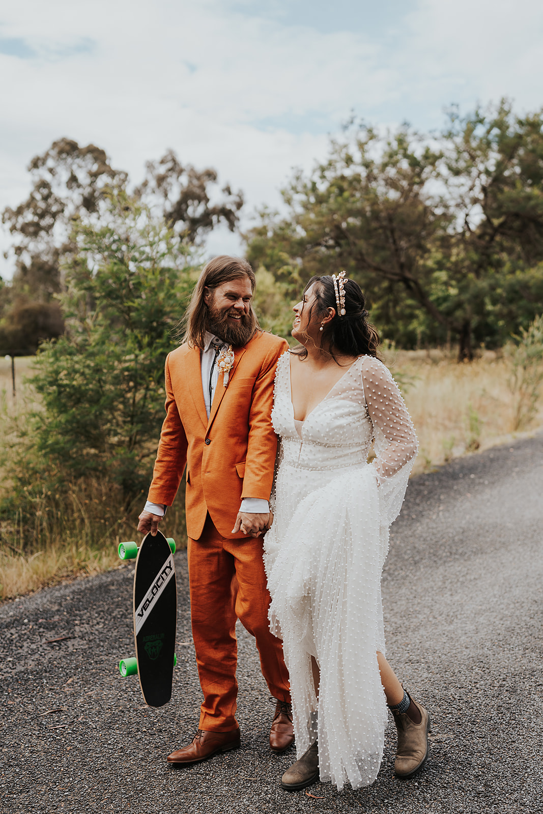 The couple spend time together skate boarding on their elopement day.