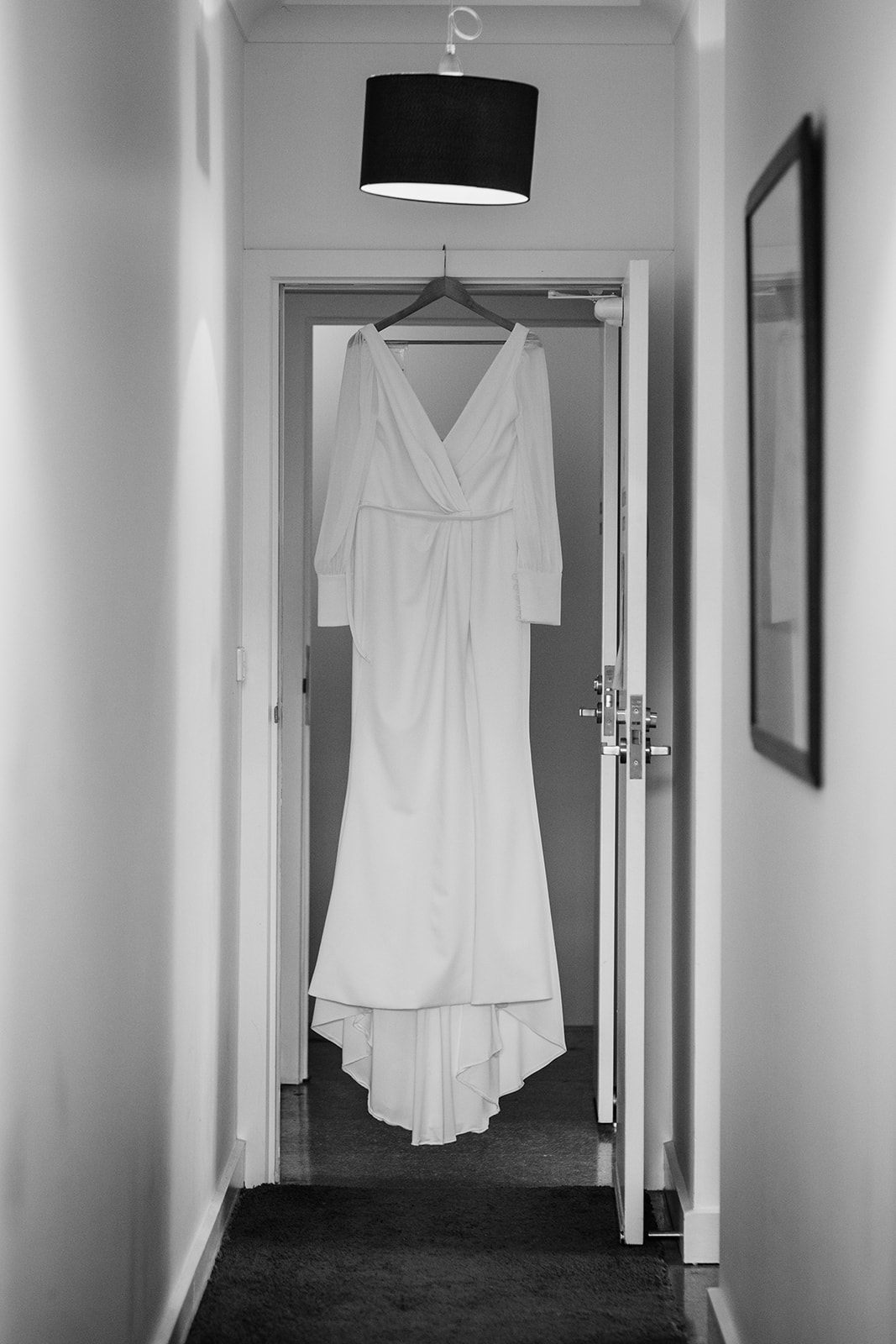 Karen Willis Holmes wedding dress. Cleavage wedding dress by Karen Willis Holmes. Cleavage wedding dress with sleeves.