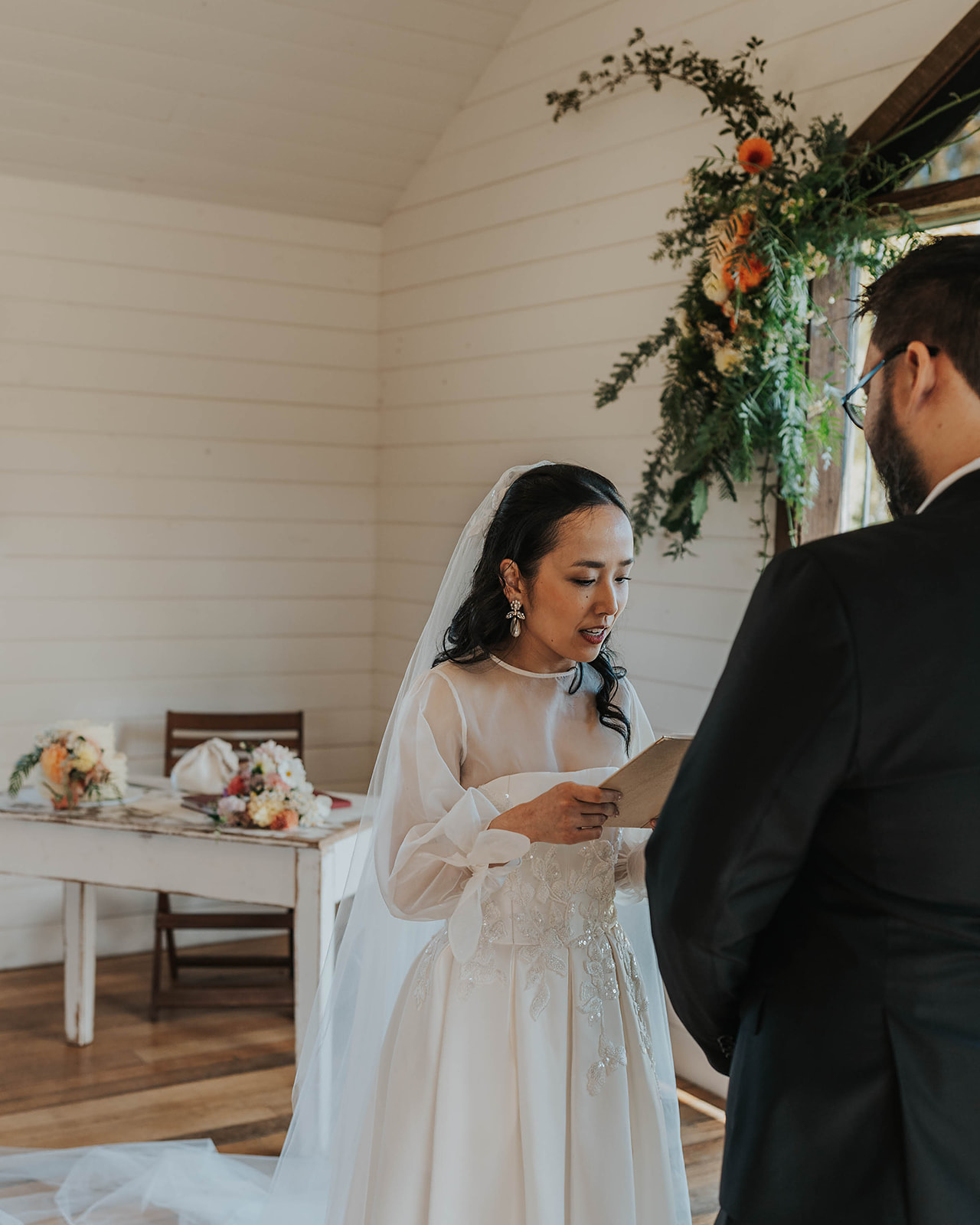 The bride exchanges her vows in an intimate ceremony at Sault, Daylesford.