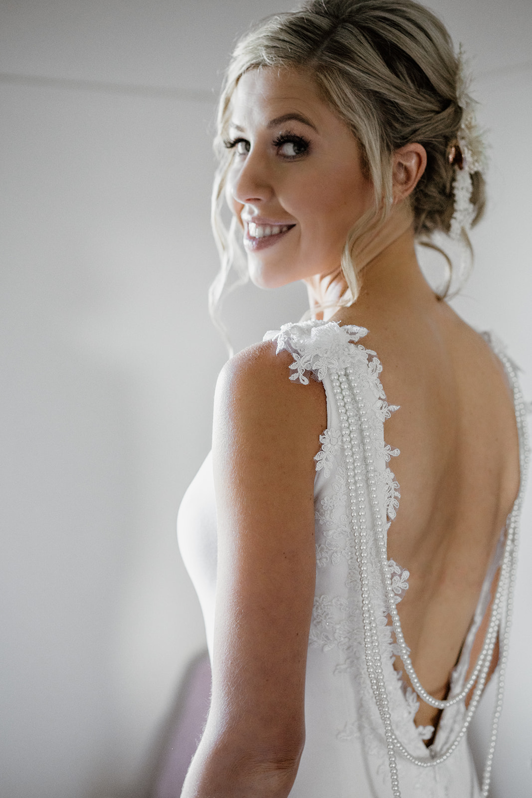 Jillian Franklin Couture wedding dress. Bridal dress by Jillian Franklin, Albury. Backless wedding dress with pearls.