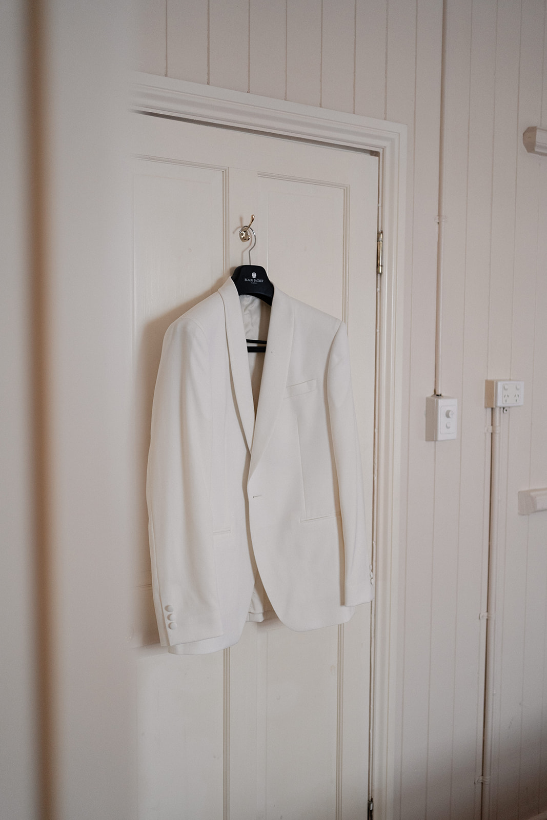 Gabbinbar Homestead Wedding Photography
Grooms white suit jacket