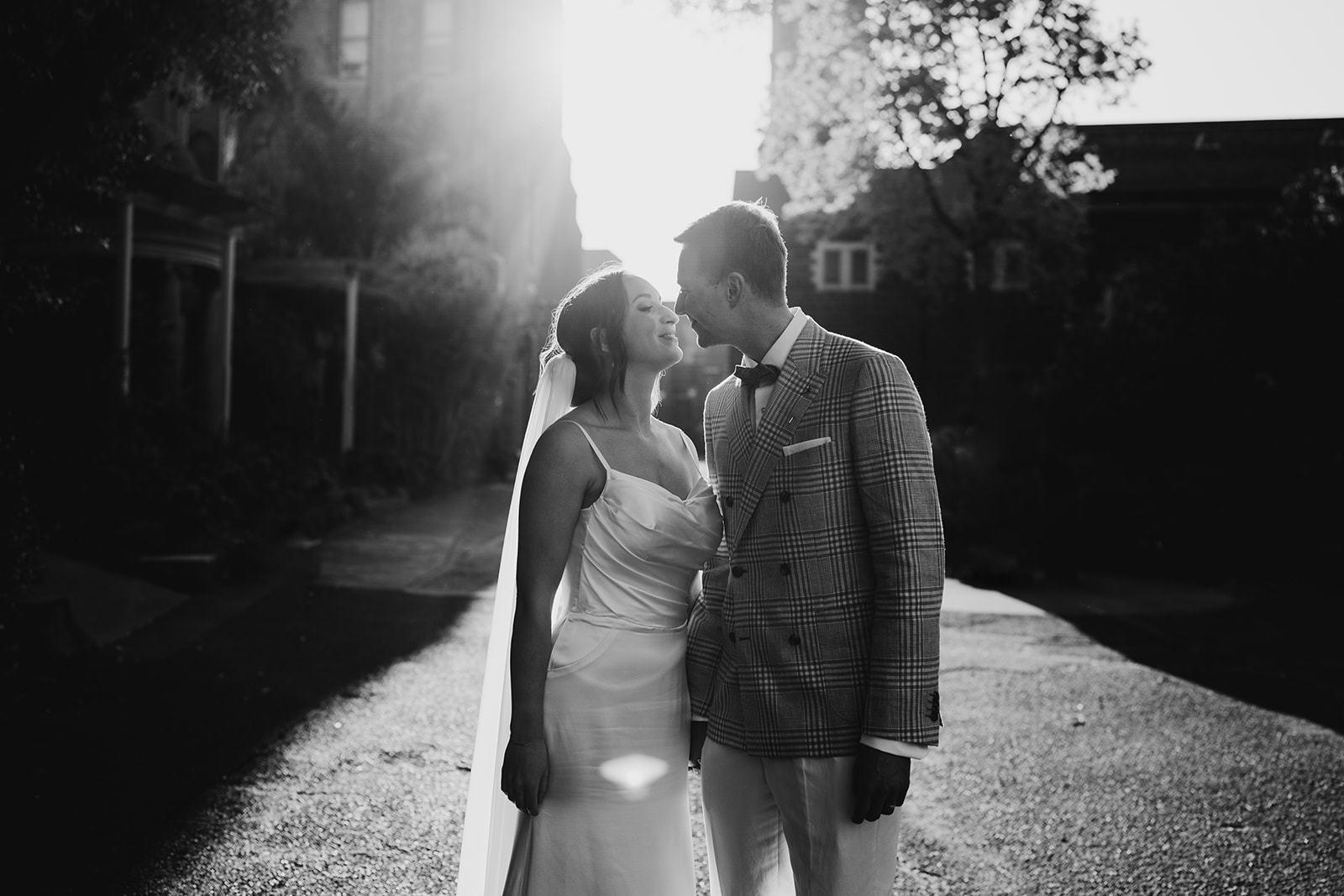 Bride and groom share a moment during there sunset portrait session in Abbotsford Convent