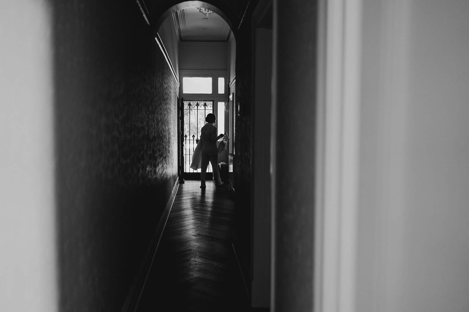 Bride walking in a corridor to get ready