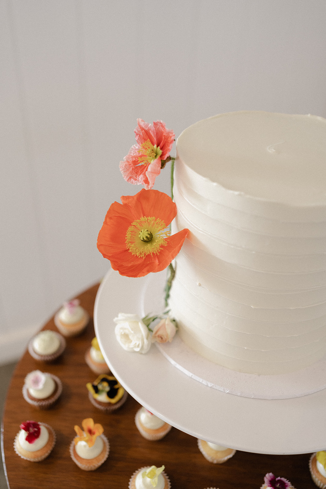 Summergrove Estate Wedding photography Reception bright delicate florals on minimal cake