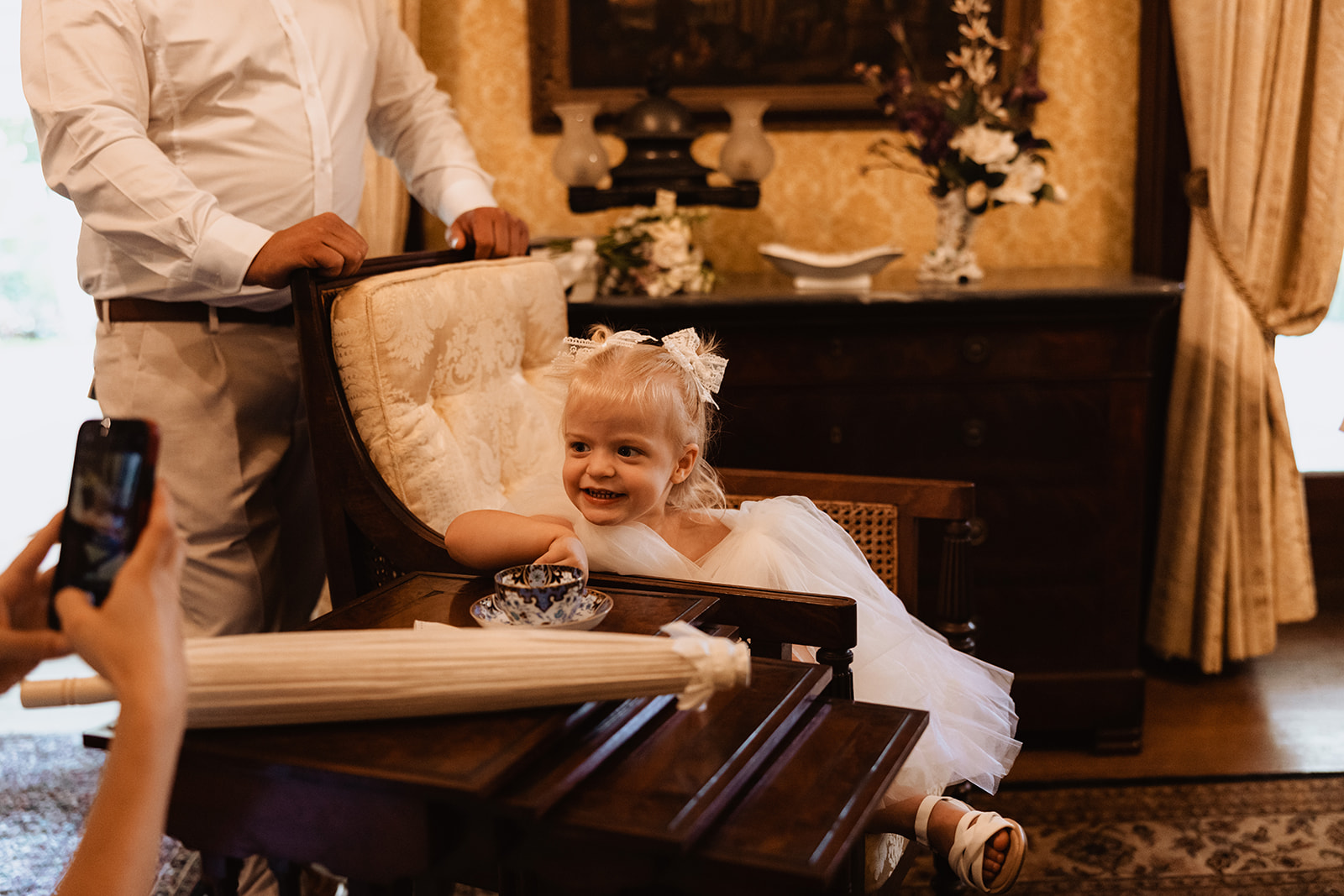 Flower girl smiling at the Wedding in Lindesay House, Darling Point New South Wales