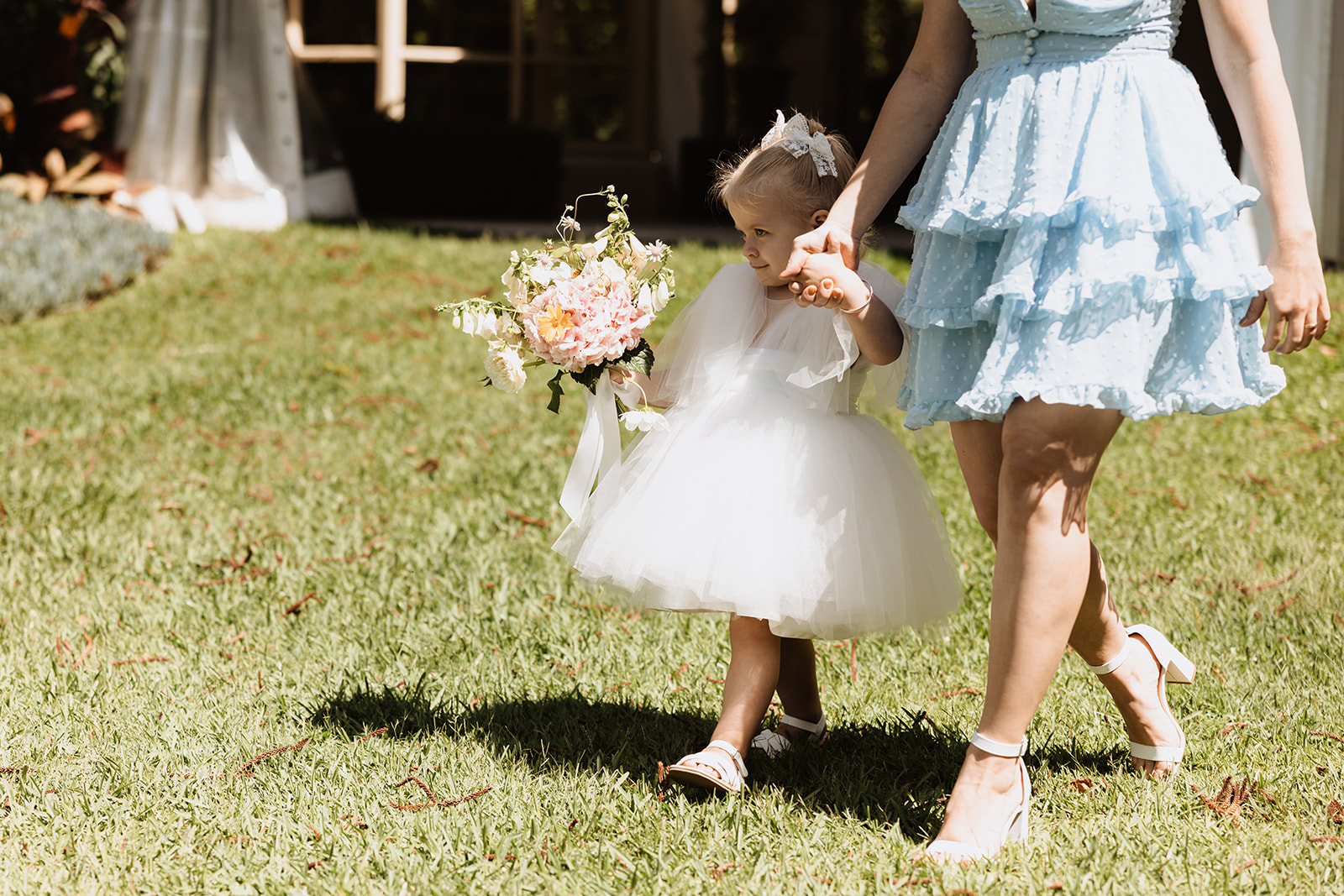 Flower girl walking down the aisle at the Wedding in Lindesay House, Darling Point New South Wales