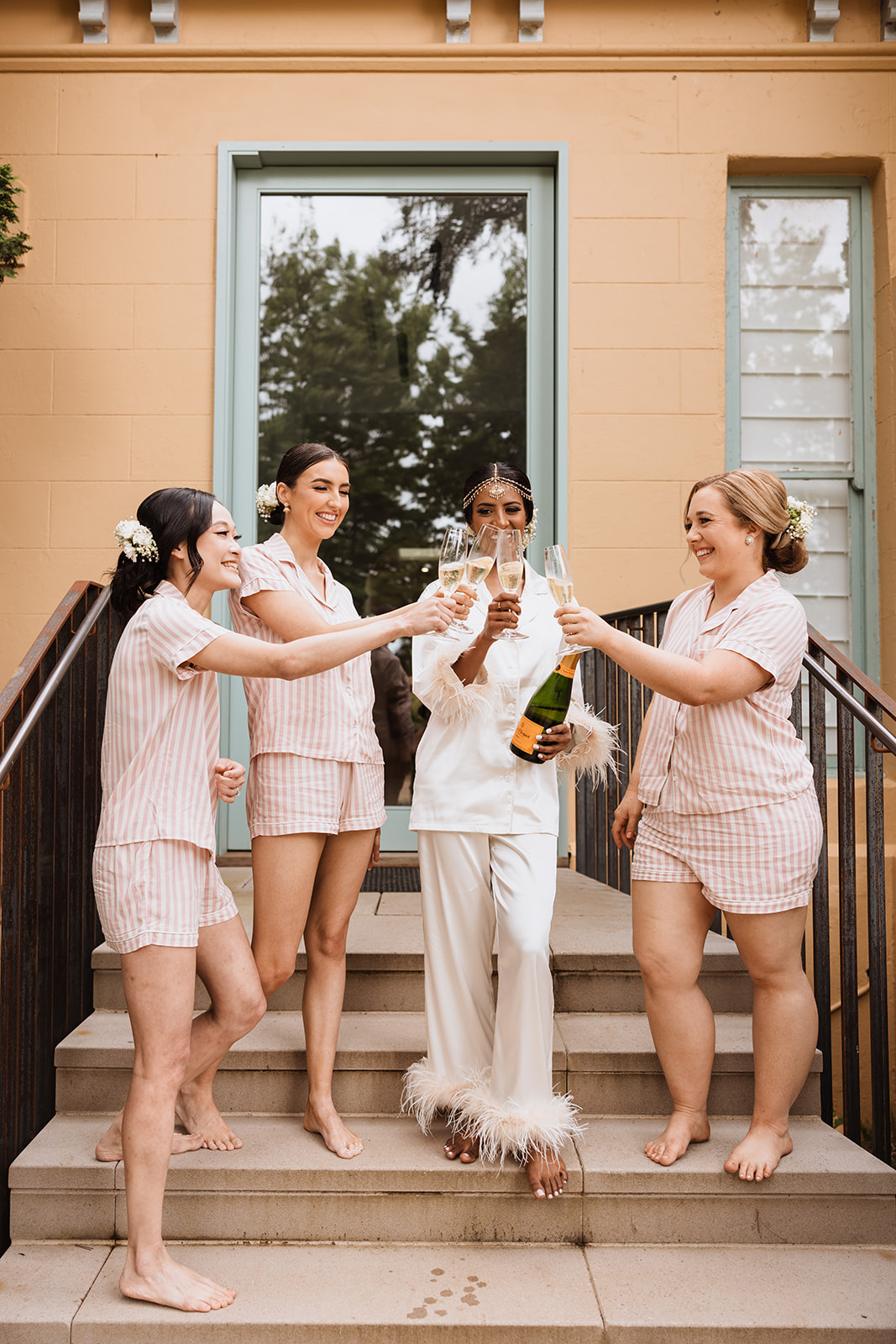 Bride with her bridesmaids for champagne shower at the Wedding in Mona Farm Braidwood, New South Wales