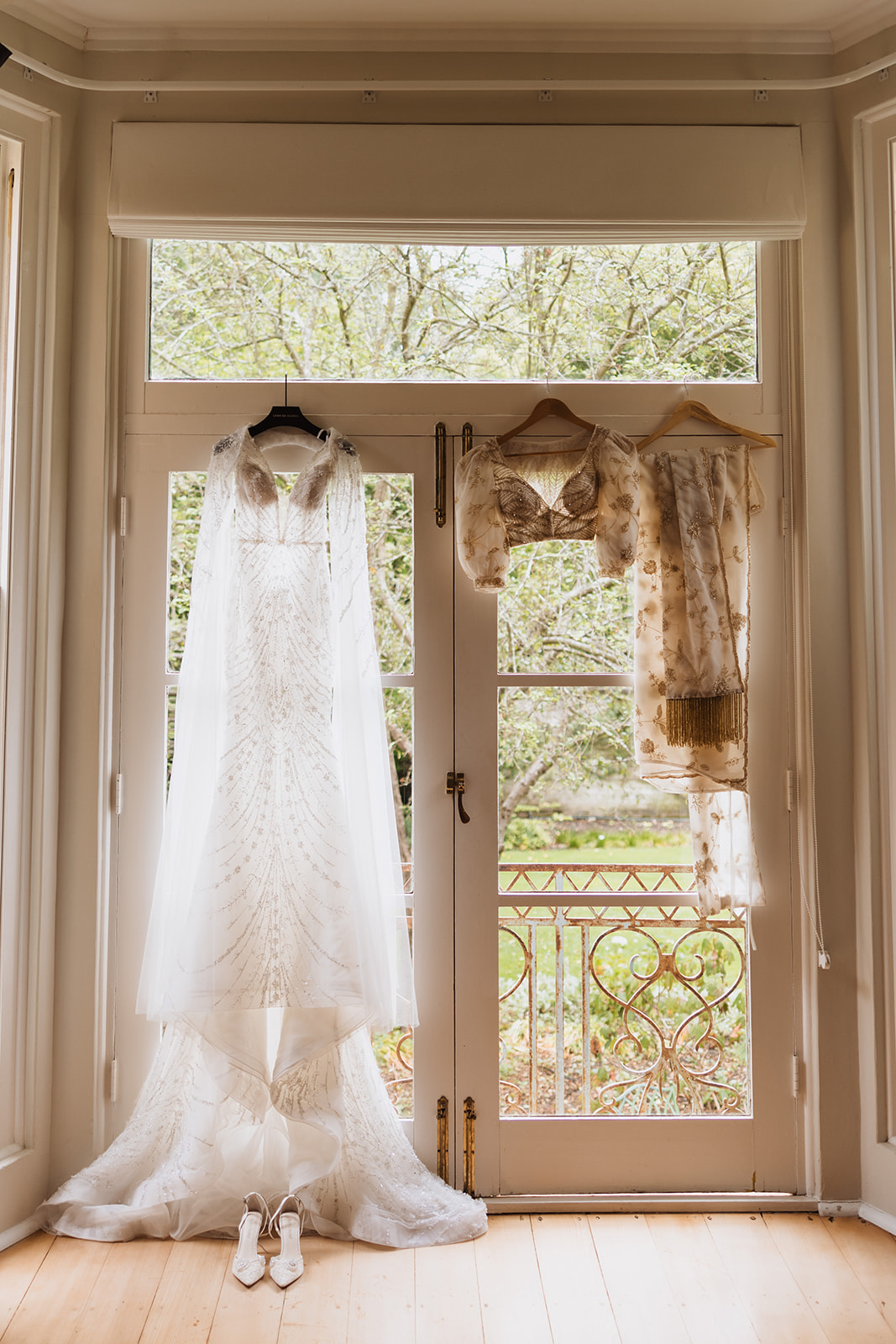 Brides dress hanging in the room at the Wedding in Mona Farm Braidwood, New South Wales