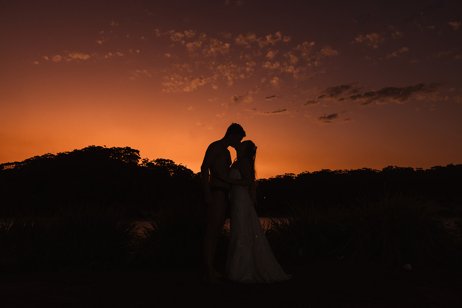 Couple sunset portrait in The Cove Jervis Bay