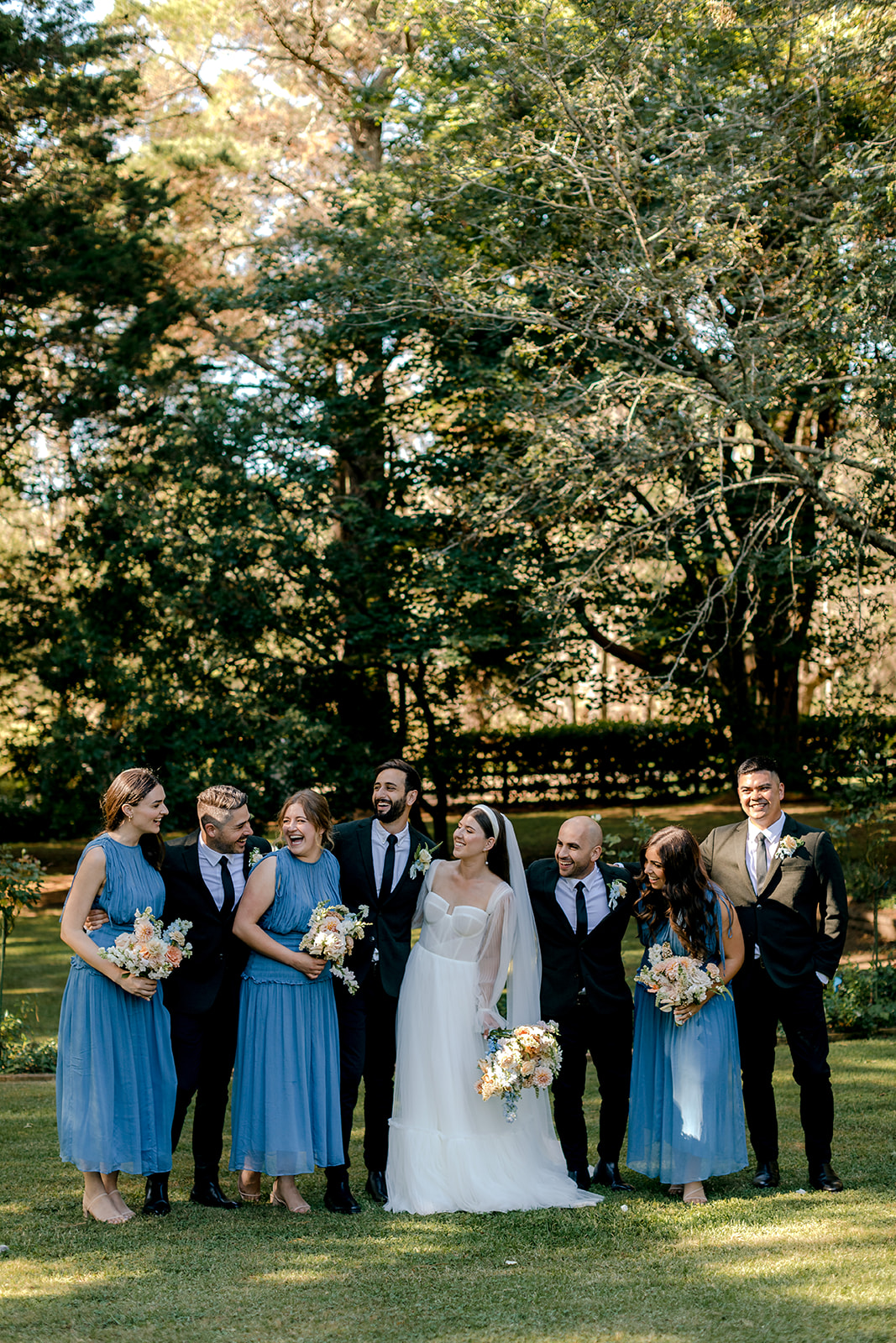 Bride & groom with their bridal party at their elegant country wedding.