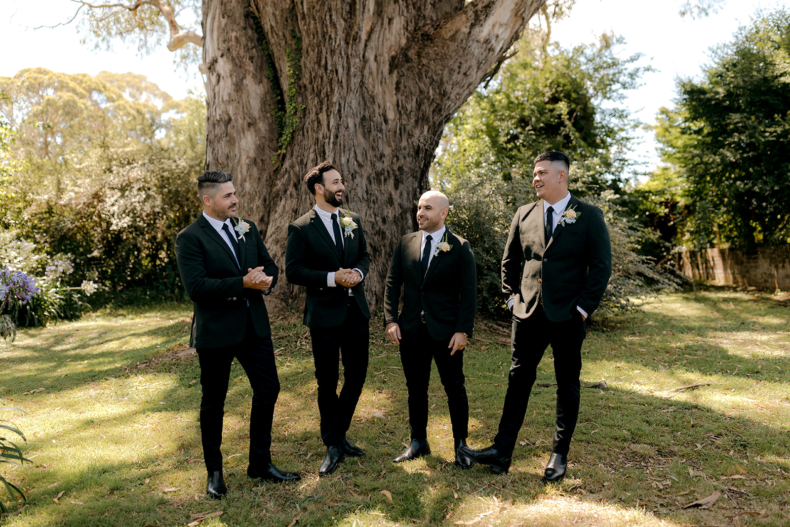 Groom with his groomsmen at his elegant country wedding.