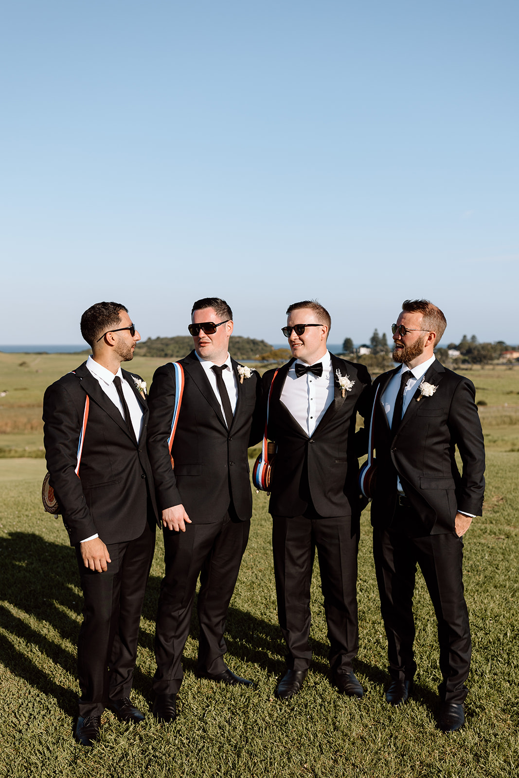 Groom and her groomsmen at the wedding in the South Coast Seacliff House