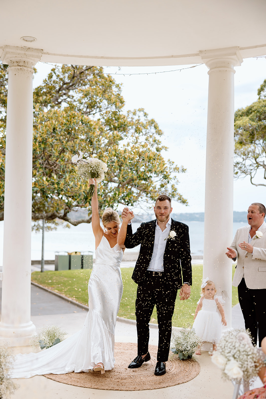 Bride and groom recessional at the wedding in The Fernery Mosman