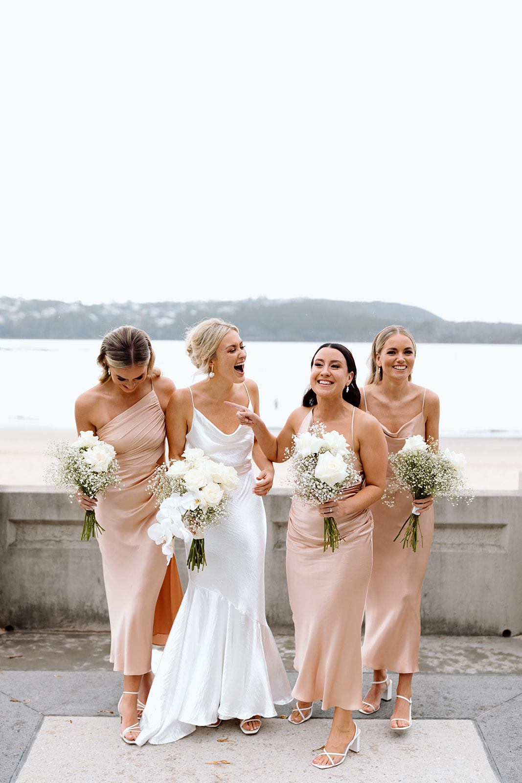 Bride with her bridesmaids at the wedding in The Fernery Mosman