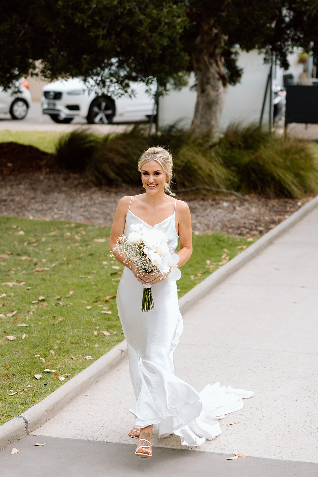 Bride walking down the aisle at the wedding in The Fernery Mosman