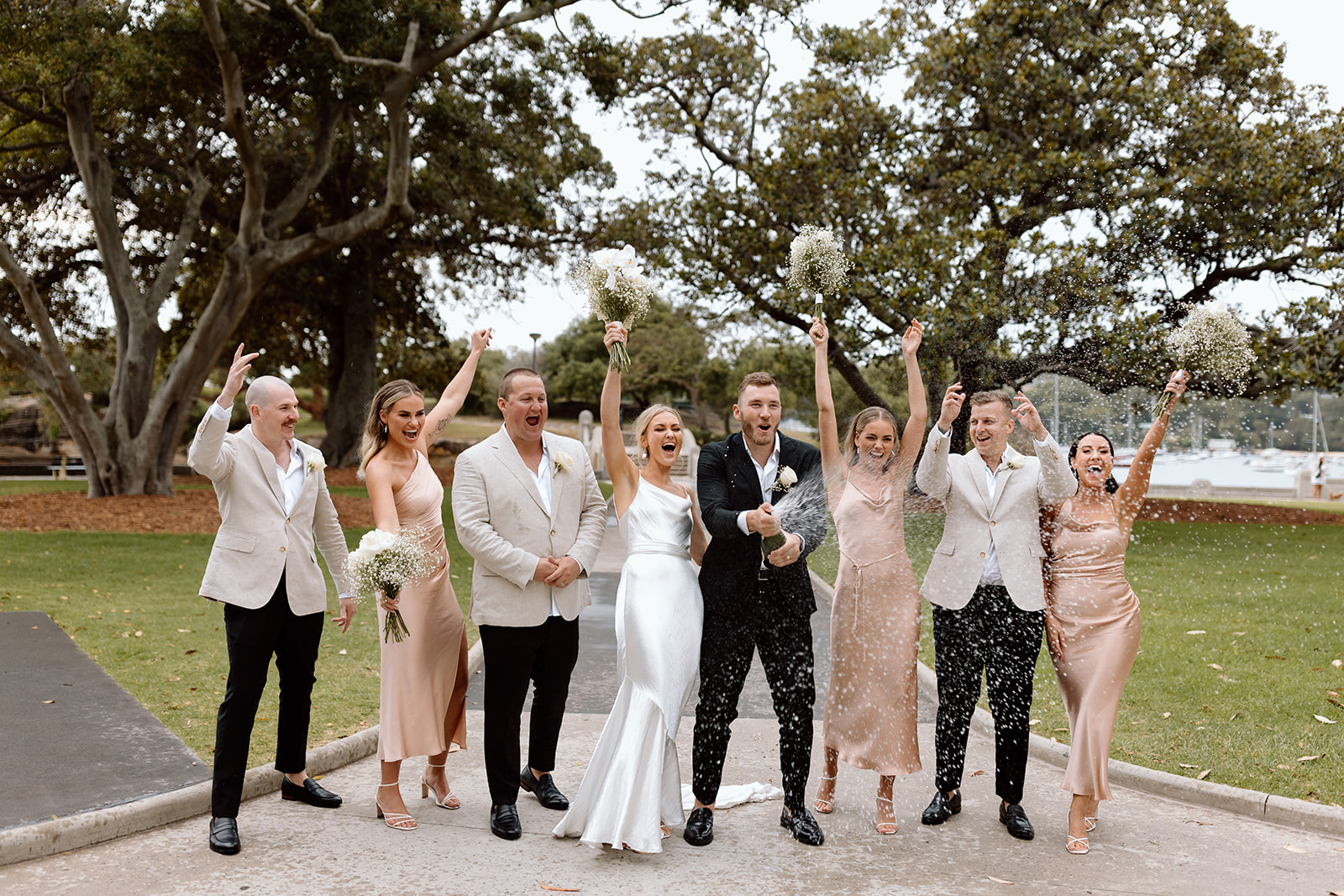 Couple with their bridal party at the wedding in The Fernery Mosman