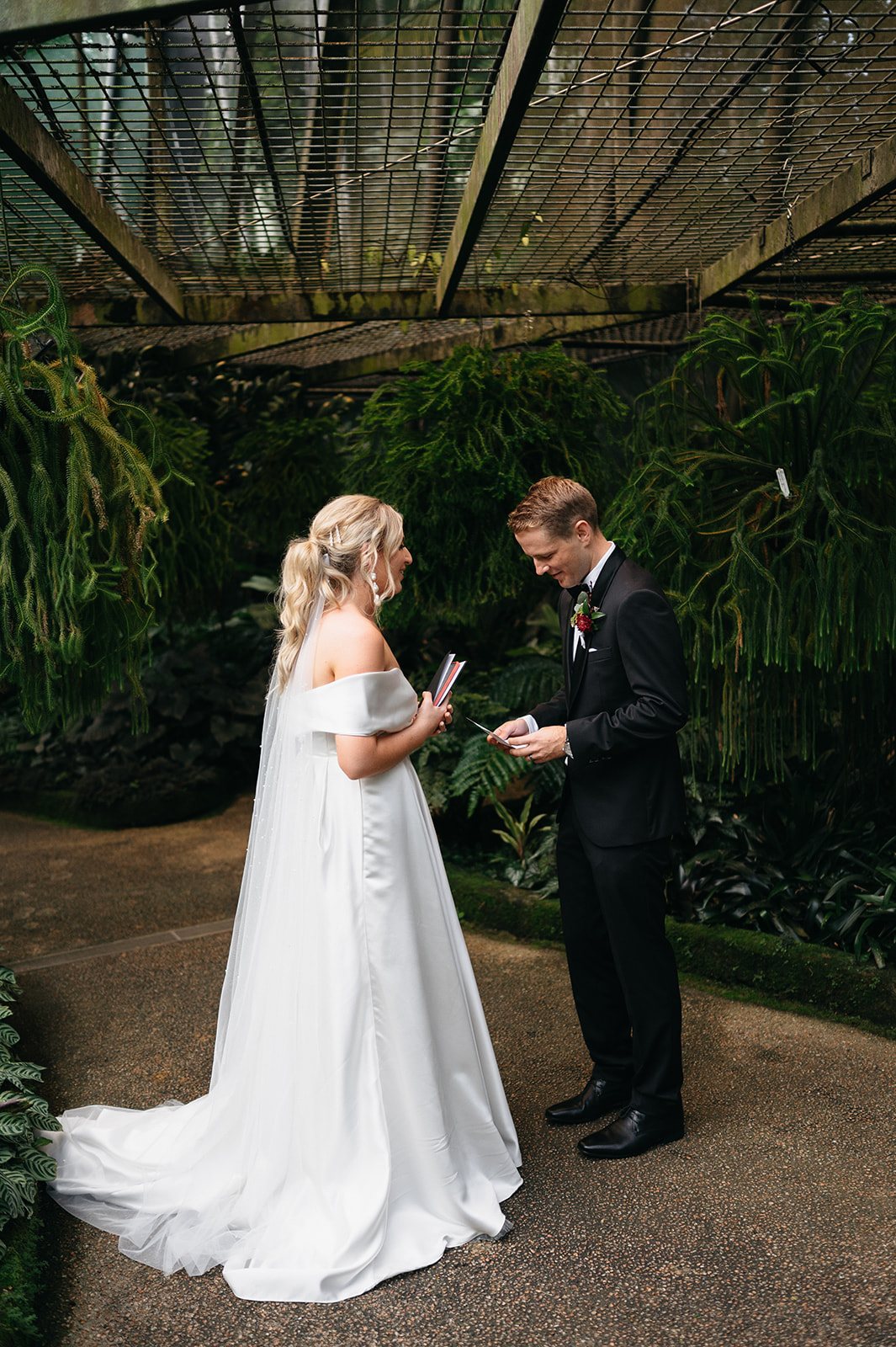 Bride and Groom having wedding photos taken in Cairns Botanical Garden