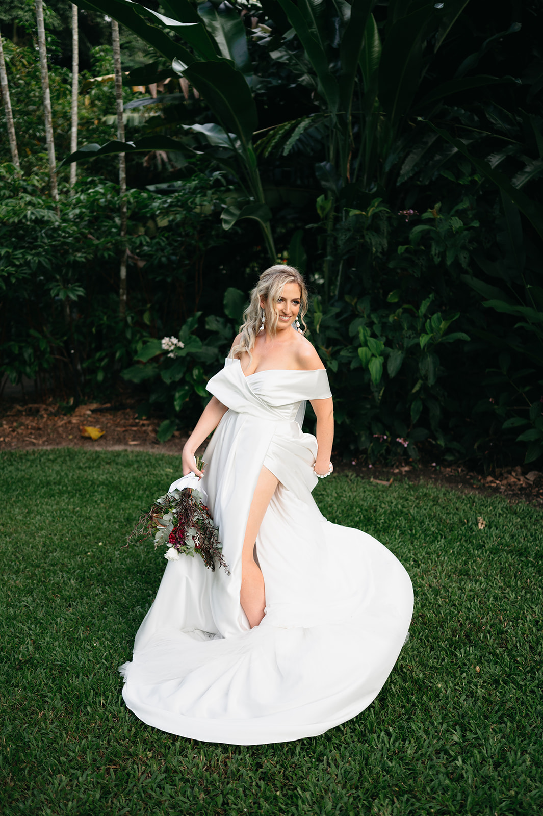 Bride having photos down in Cairns Botanical Garden