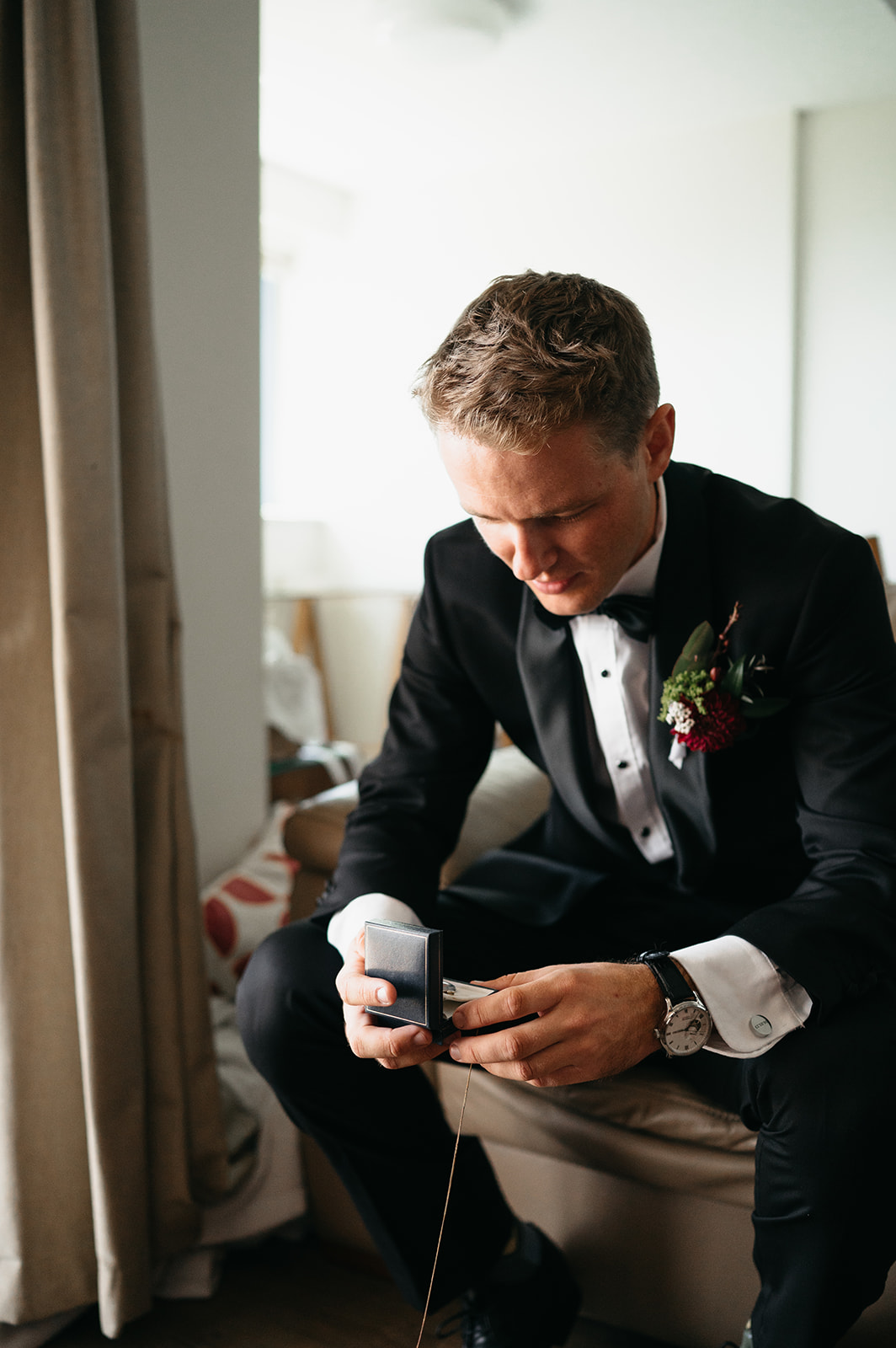 groom getting ready with groomsmen in cairns