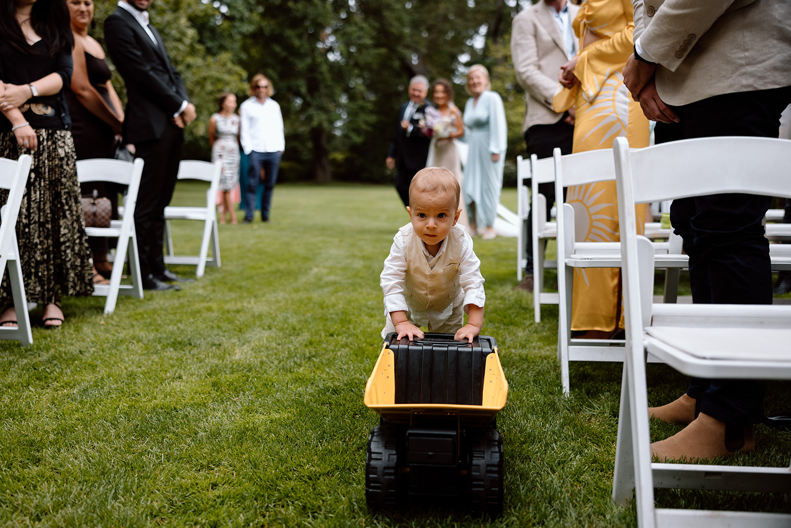 Little groom walking at the aisle at the wedding in the Southern Highlands Bendooley Estate