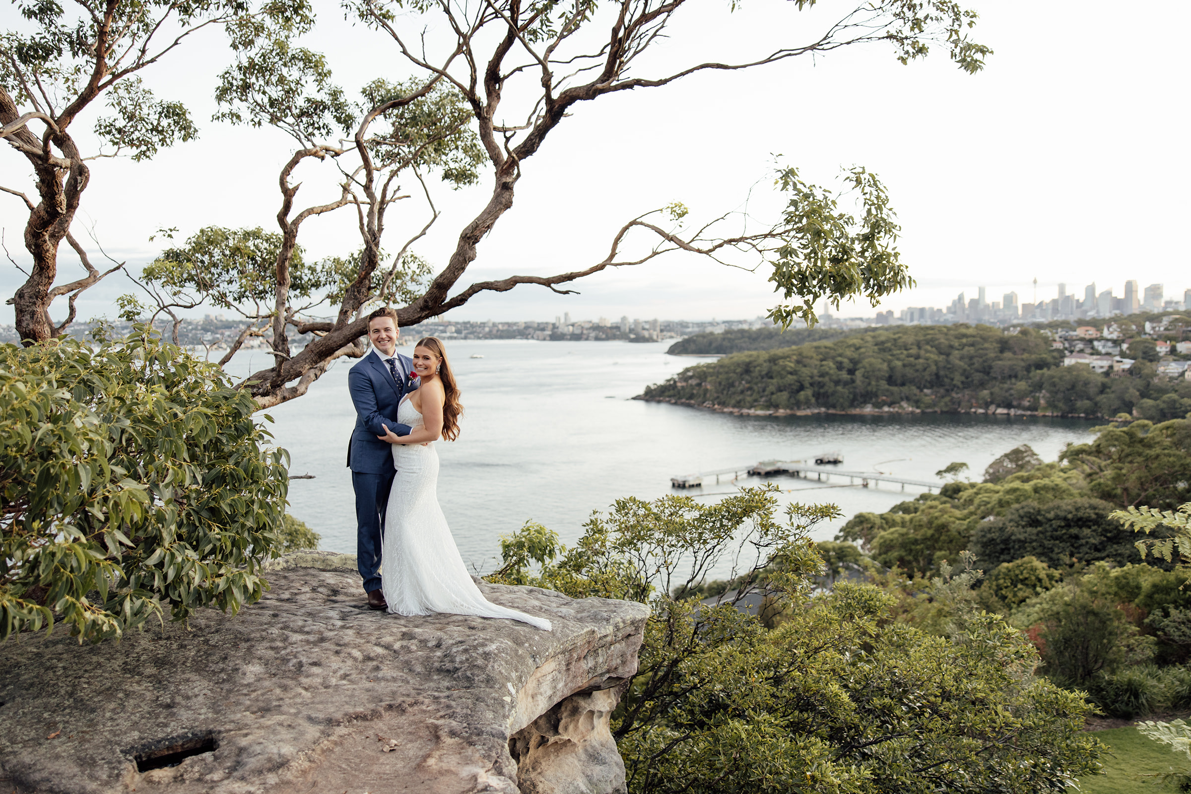 A bride and groom at Gunner's Barracks with Sydney Harbour views