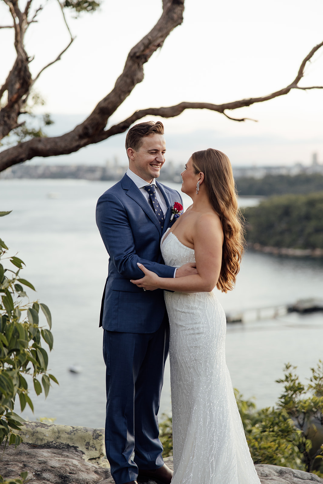 A bride and groom with ocean views