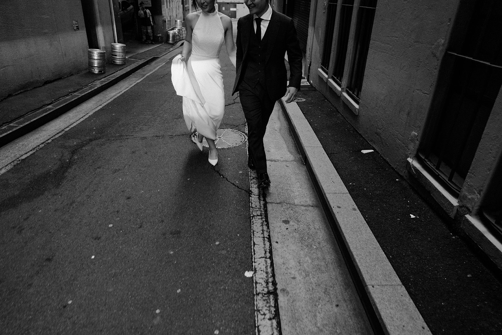 And groom walking in the back-streets of Sydney