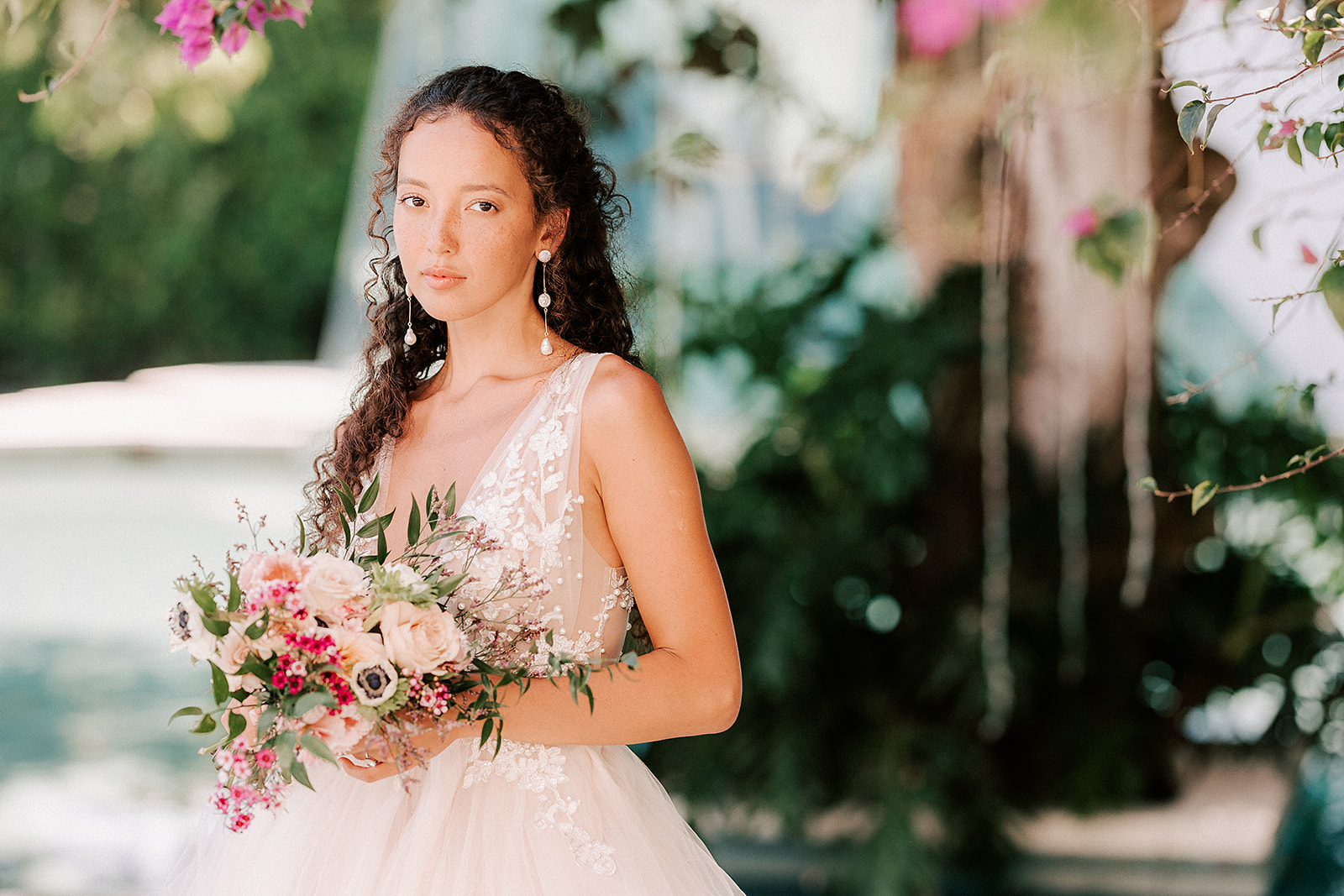 bride holding her luxury bouquet and looking at the camera as taken by Melbourne Wedding Photographer Joanne Keighery