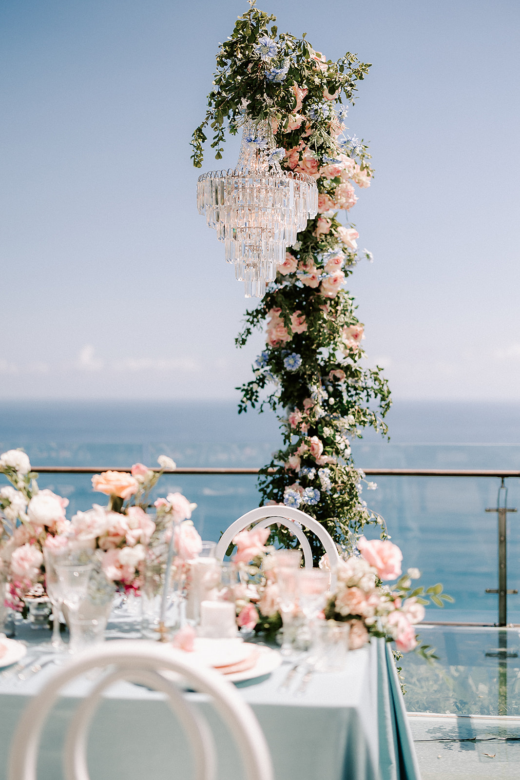 wedding reception table overlooking the ocean at Tirtha Bali