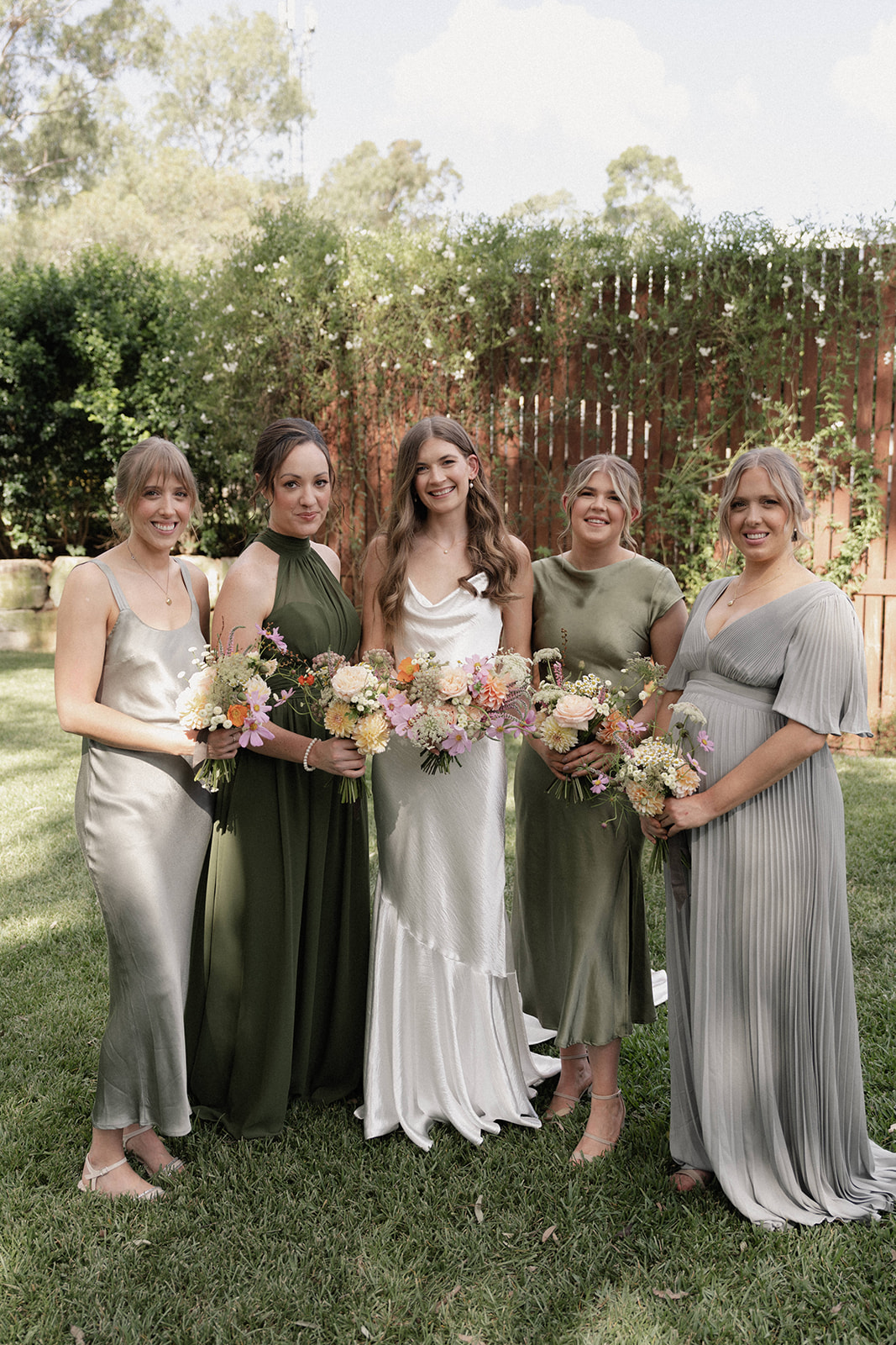 Brisbane editorial backyard wedding photography, Bridesmaids in mixed greens