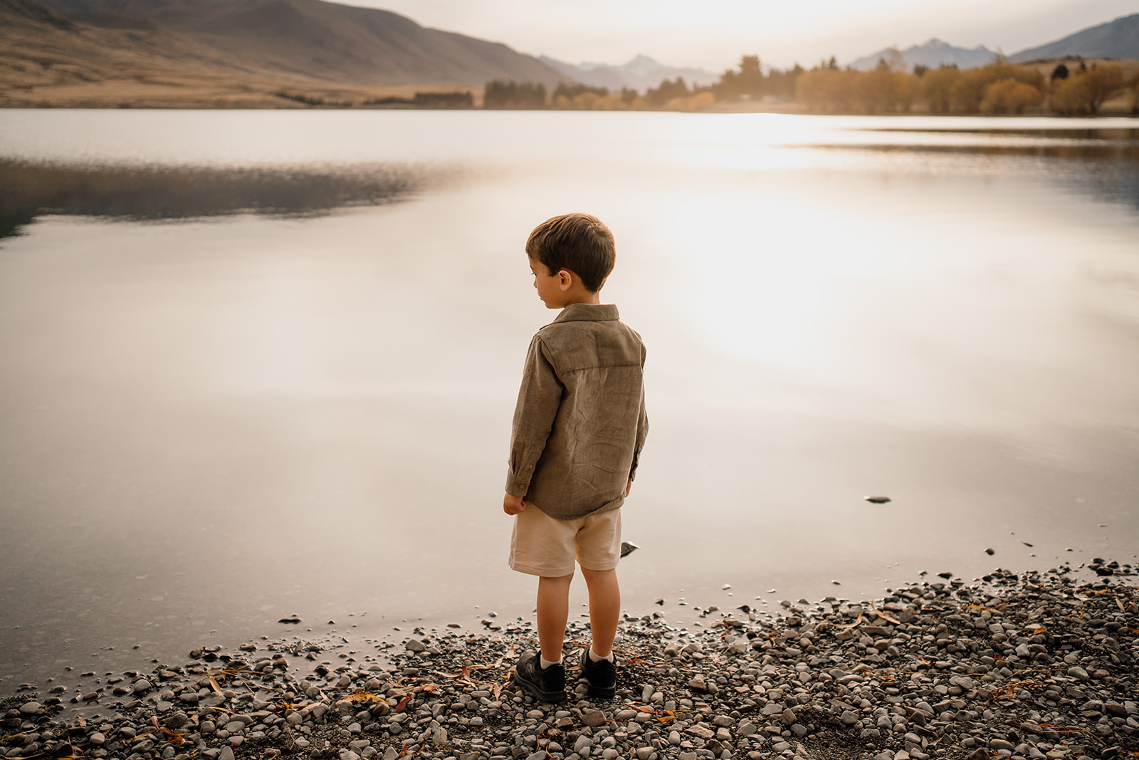 little boy by lake