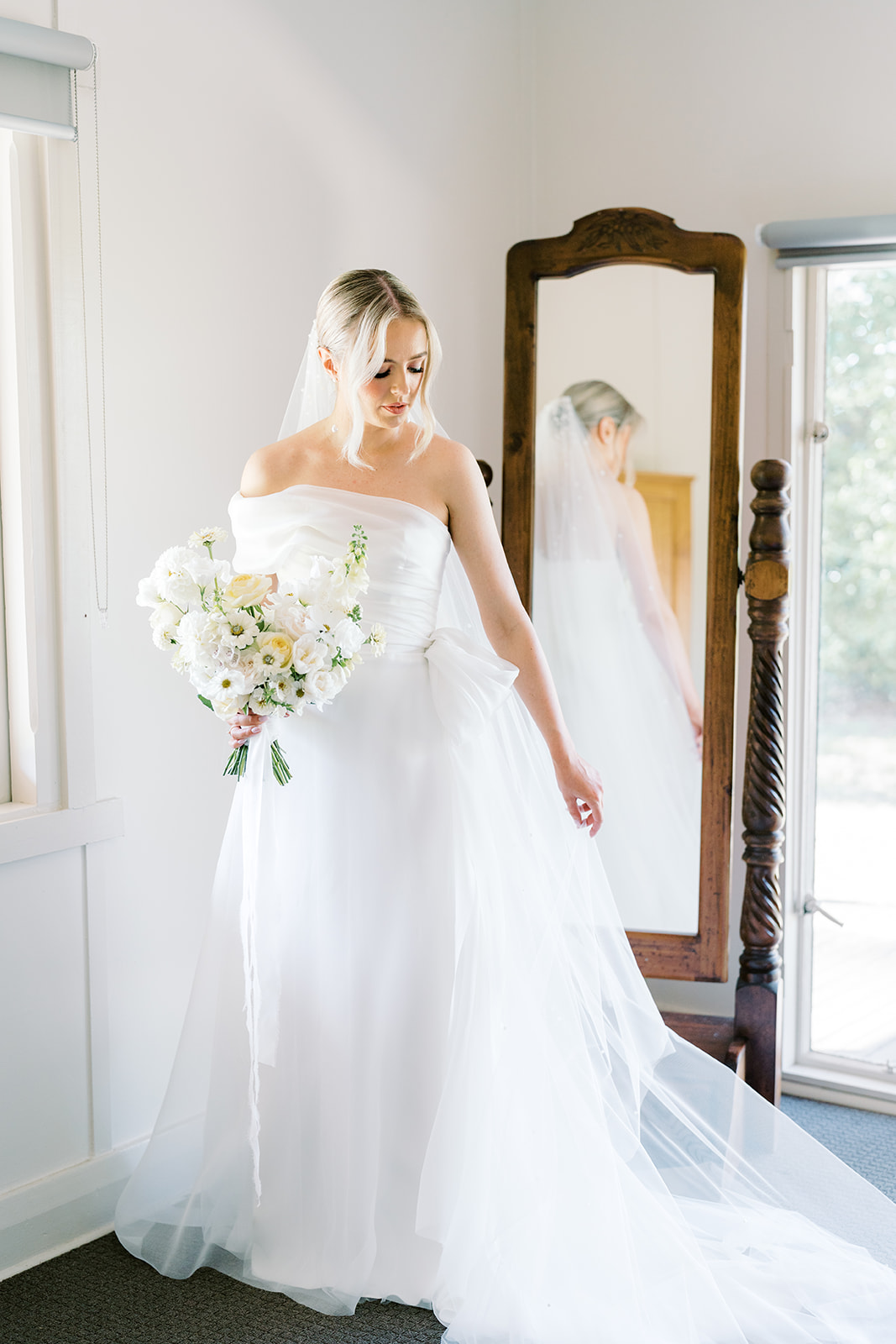 Custom-made Greta Kate wedding gown on the bride