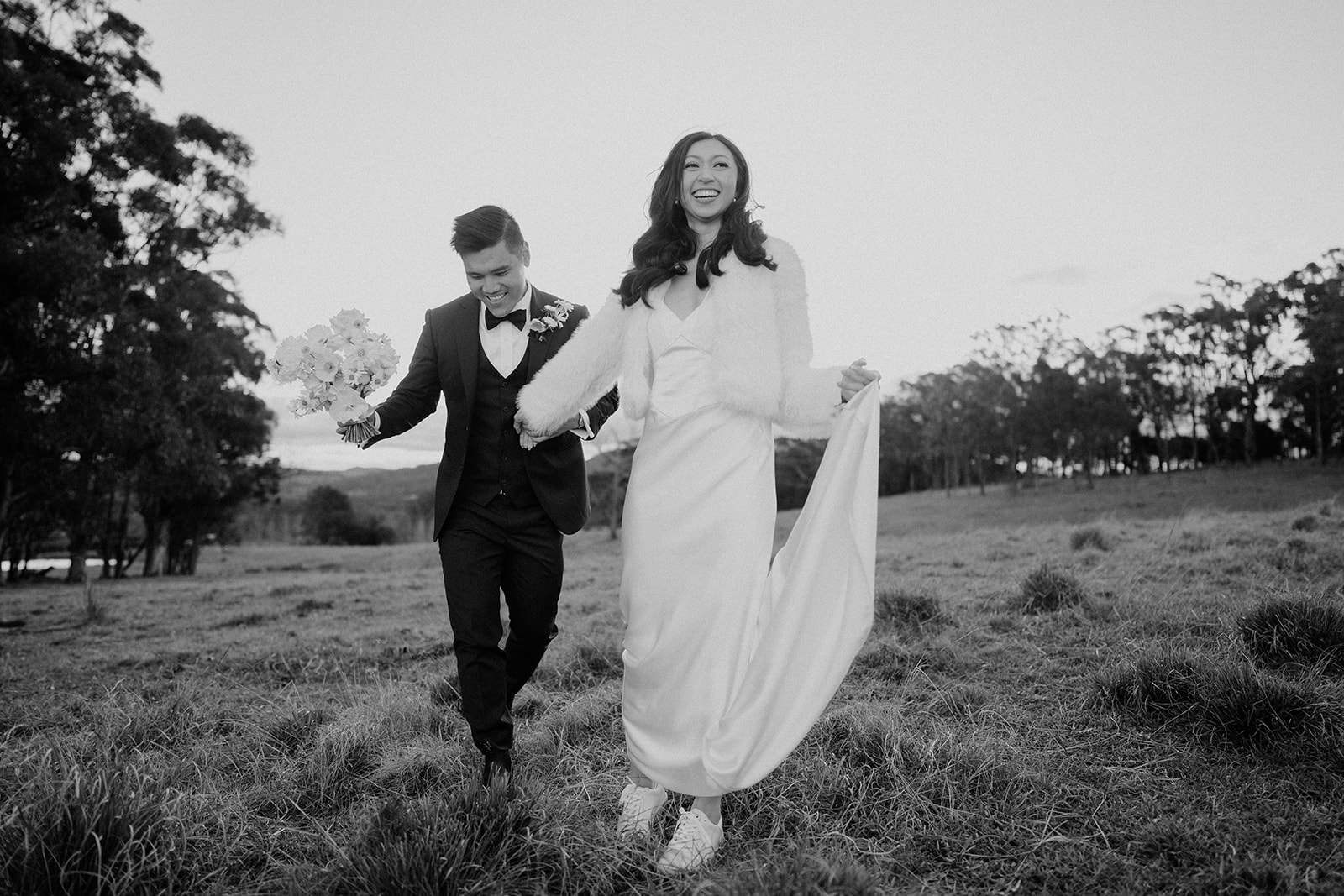 Bride and groom out on the field in the Southern Highlands
