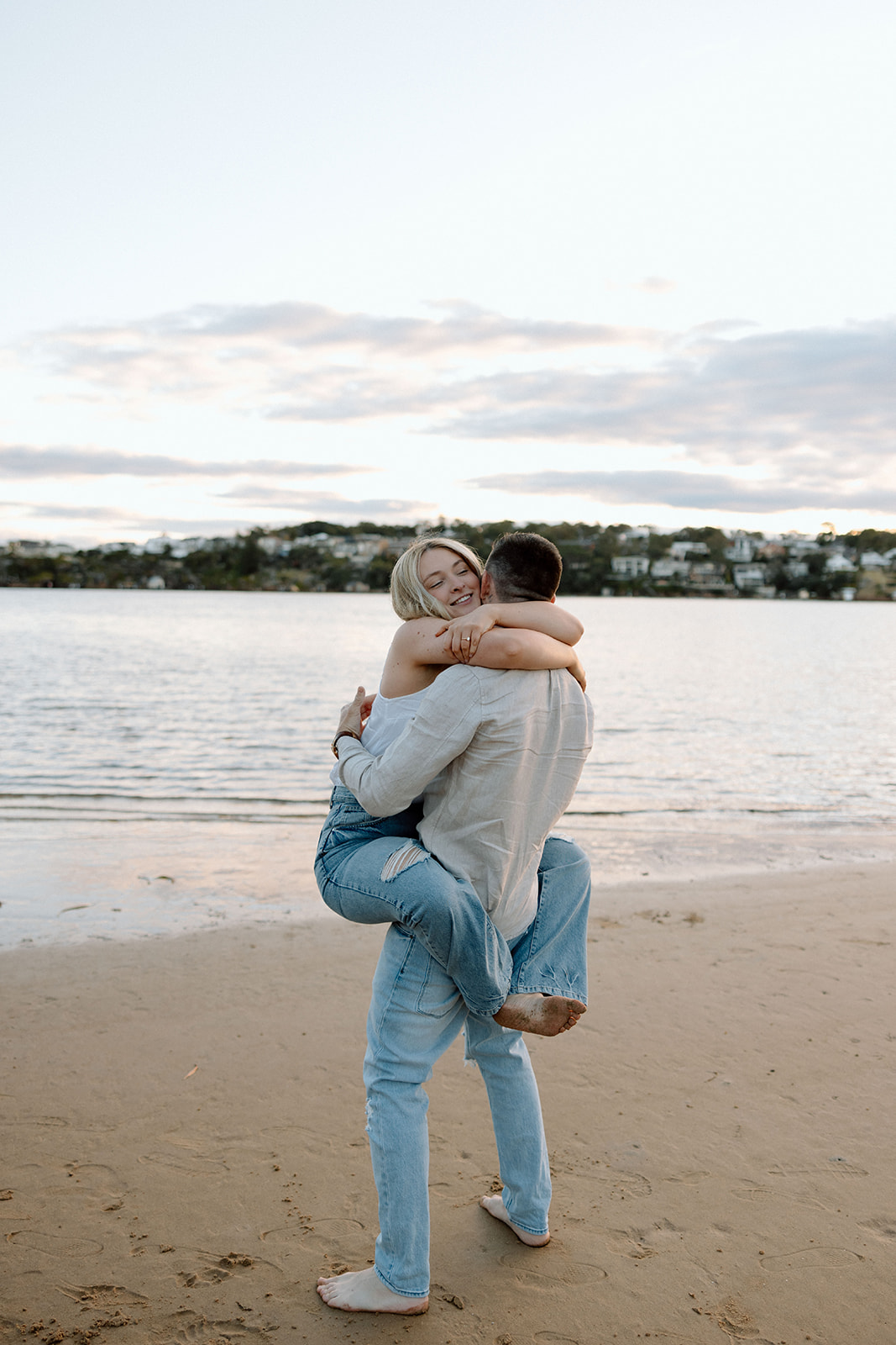couple kissed at their beach pre wedding session