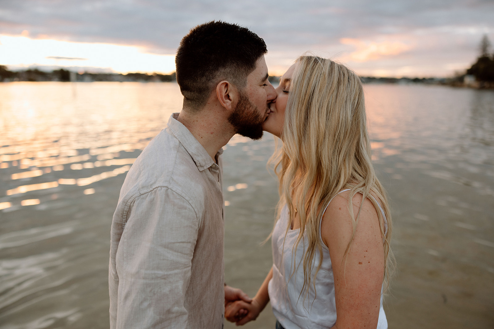 couple kissed at their beach pre wedding session