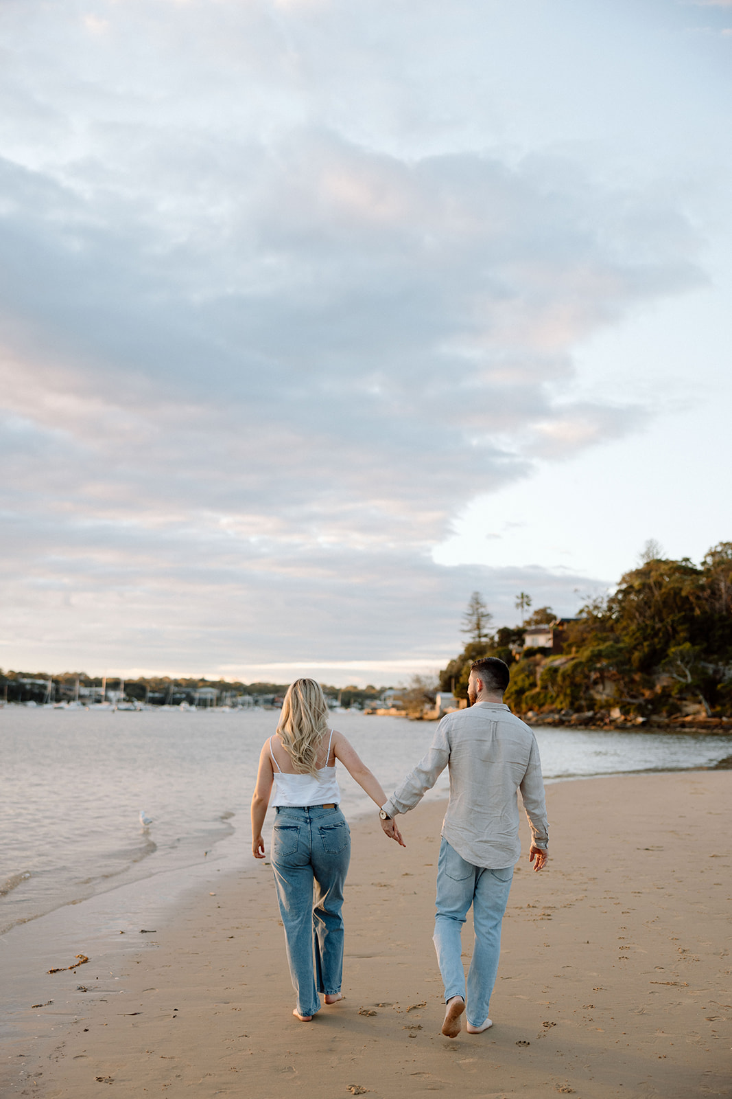 Couple under sunset in beach pre wedding session