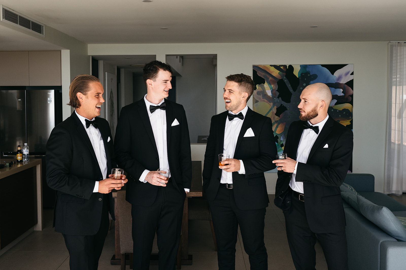 portraits of groom and groomsmen at Airlie Beach