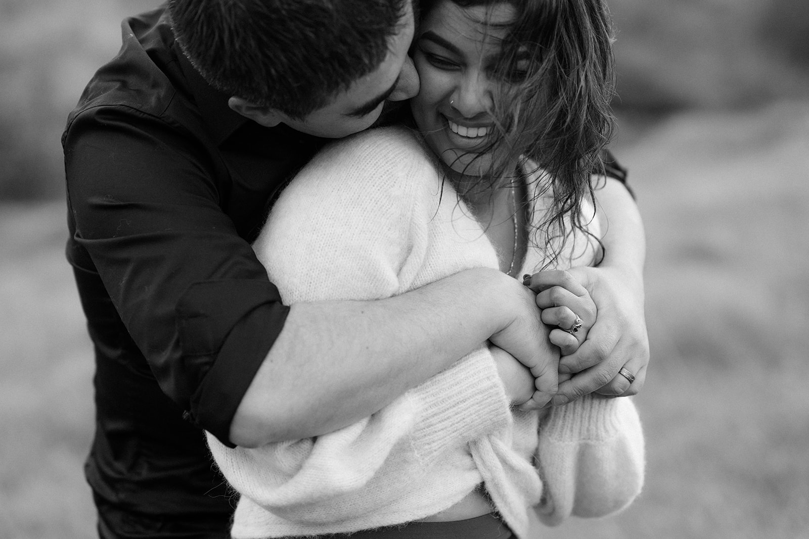 Pre-wedding photoshoot in Mornington, the couple embraces each other tenderly, finding comfort and warmth in each other'