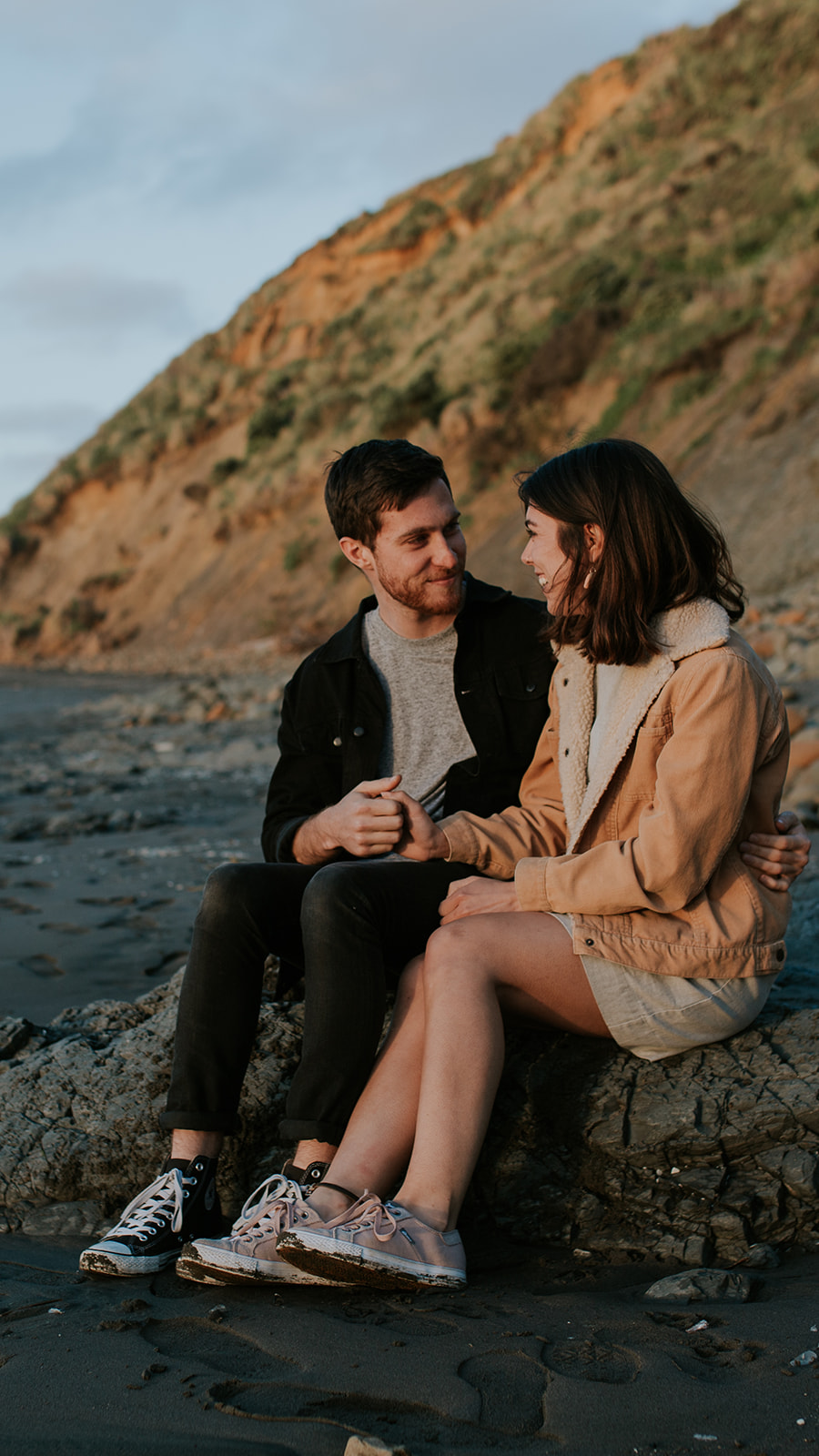 A couple who decided to have their engagement portraits taken at Port Waikato.