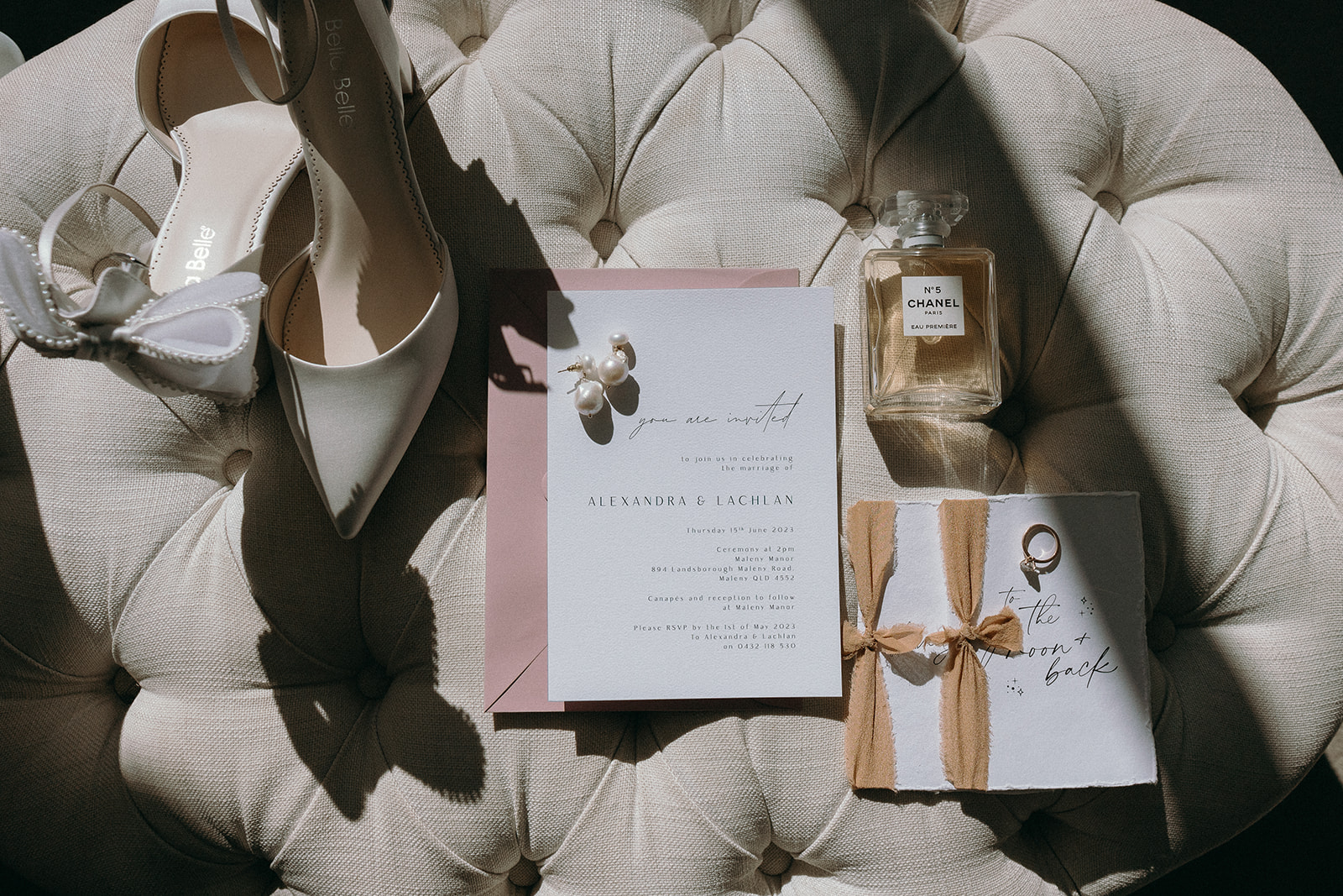 A flatlay of the brides details at maleny manor 