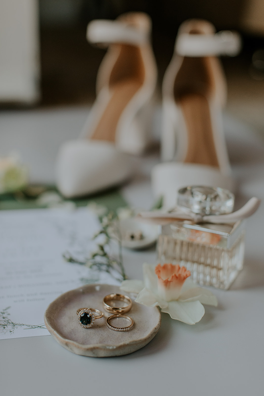 bridal details and accessories photographed with shallow depth of field from a low angle at Redleaf wedding 