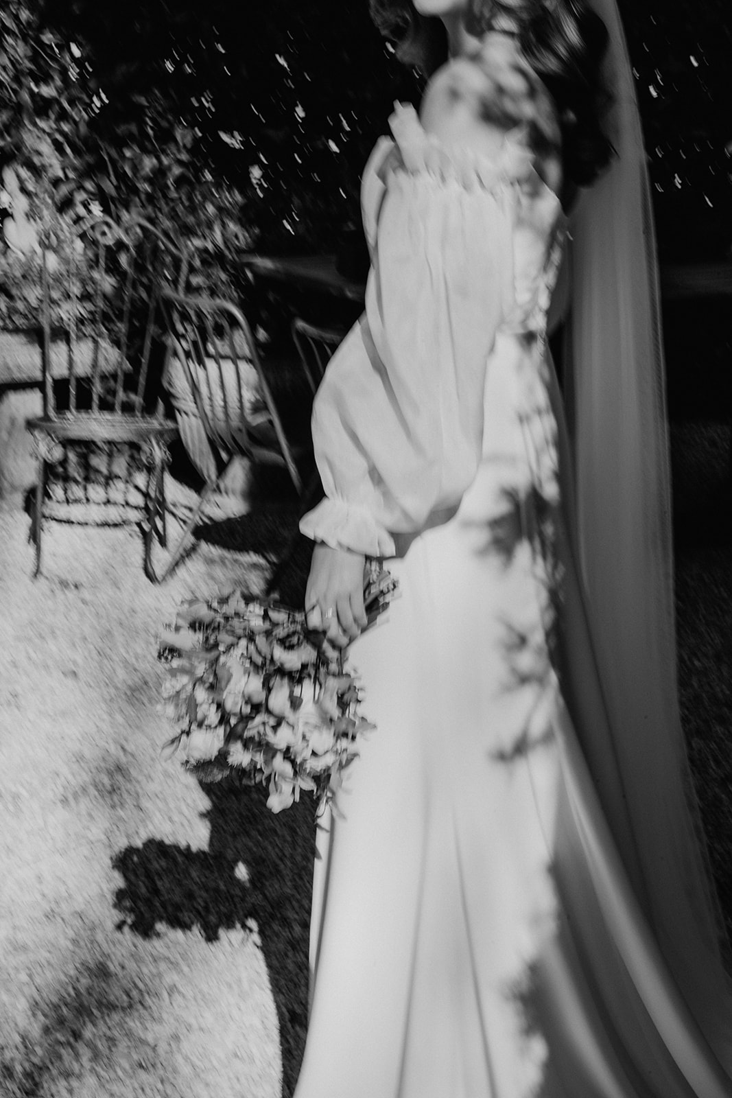 Redleaf wedding brides profile holding flowers blur balck and white