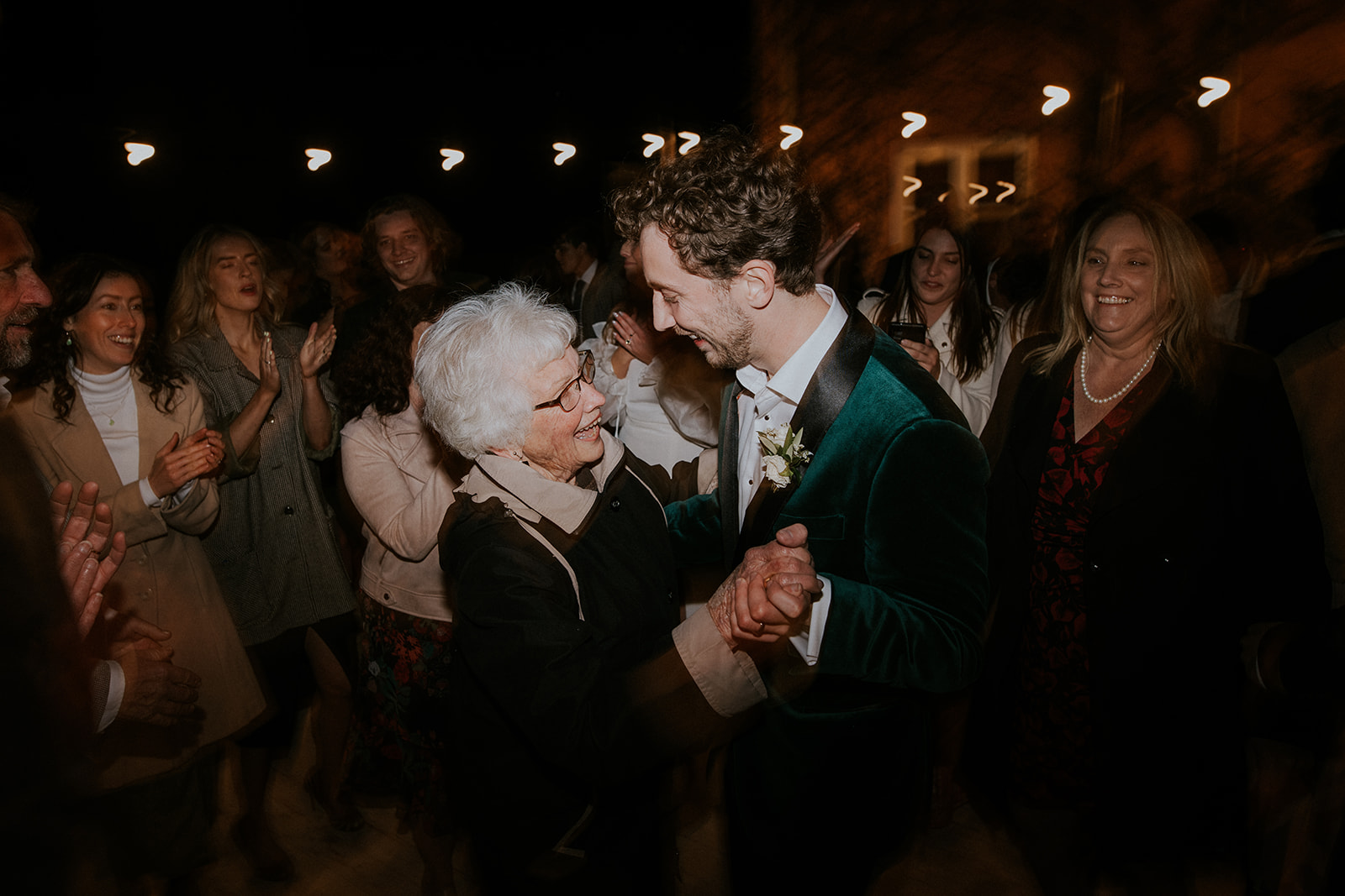 Redleaf wedding groom dances with grand parent
