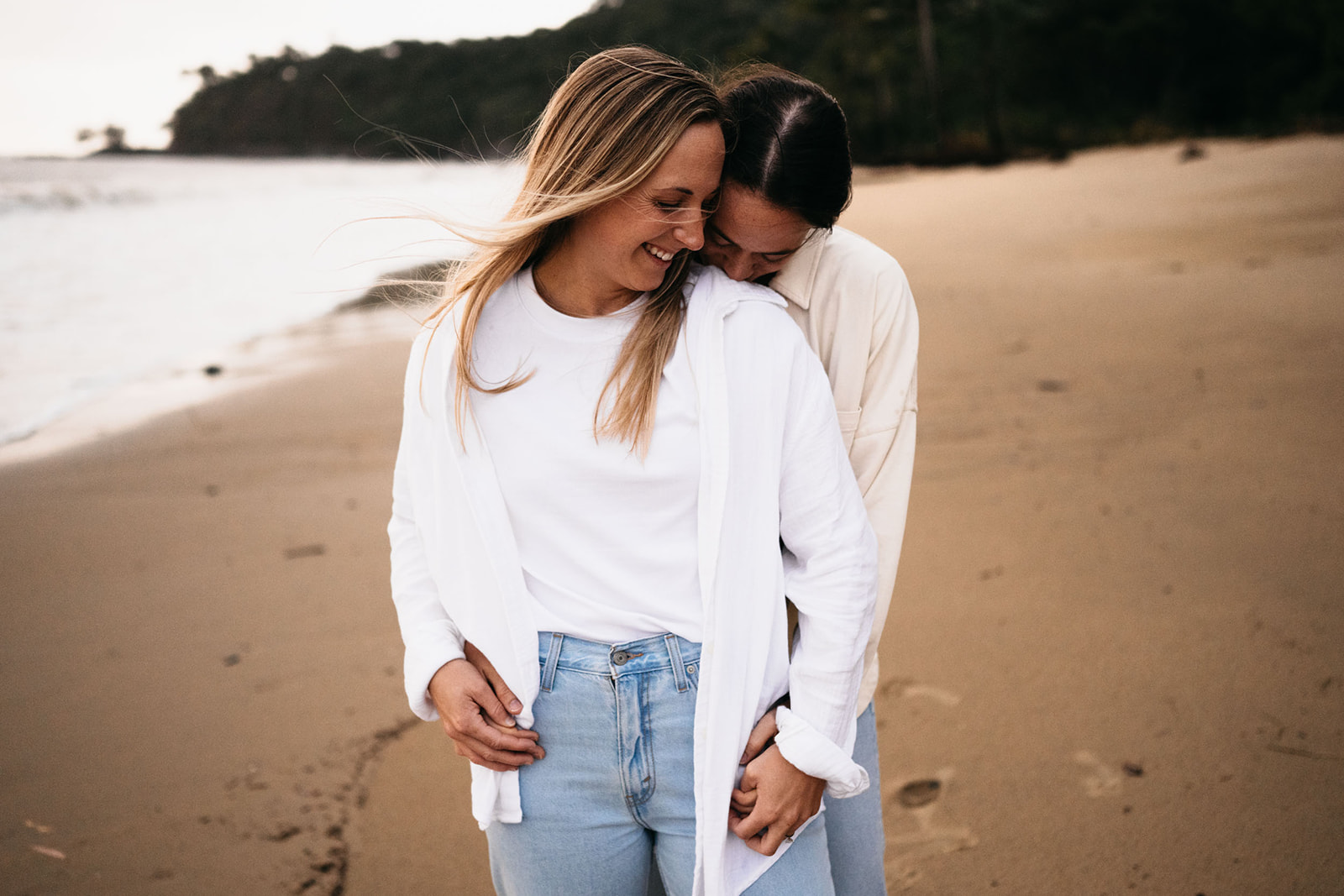 Engagement photos on the beach with female couple