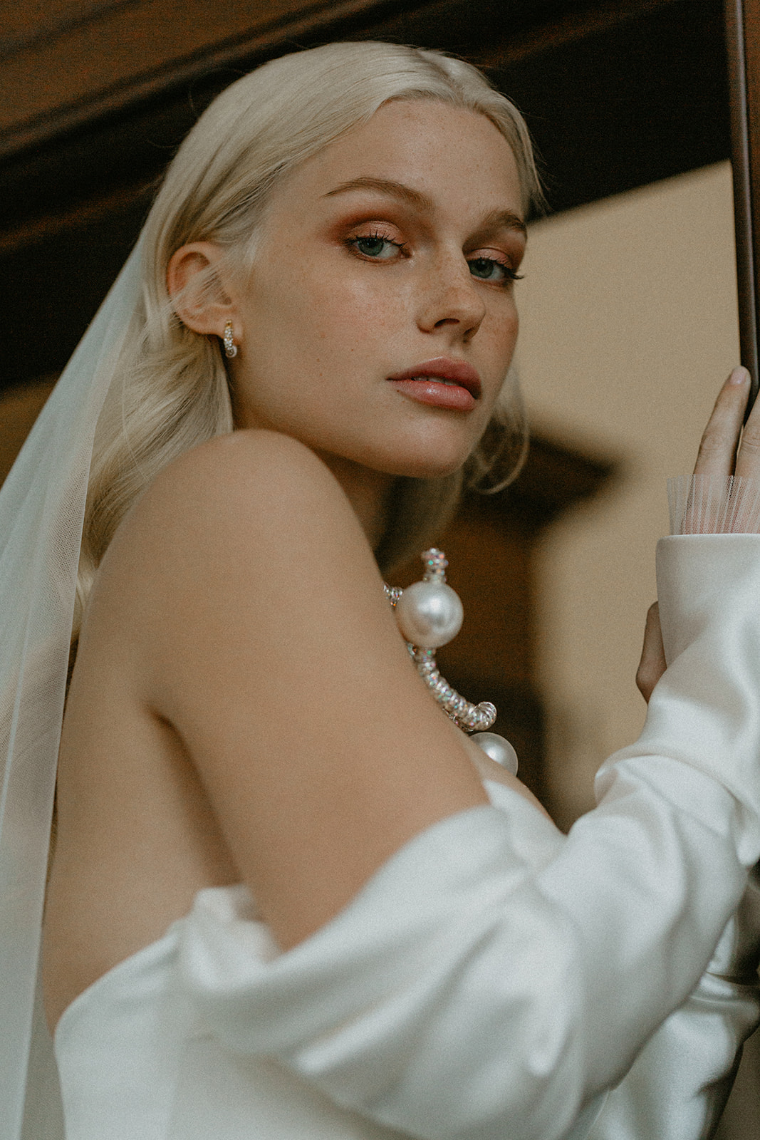 Romantic and artistic wedding portrait with contemporary and timeless bridal look